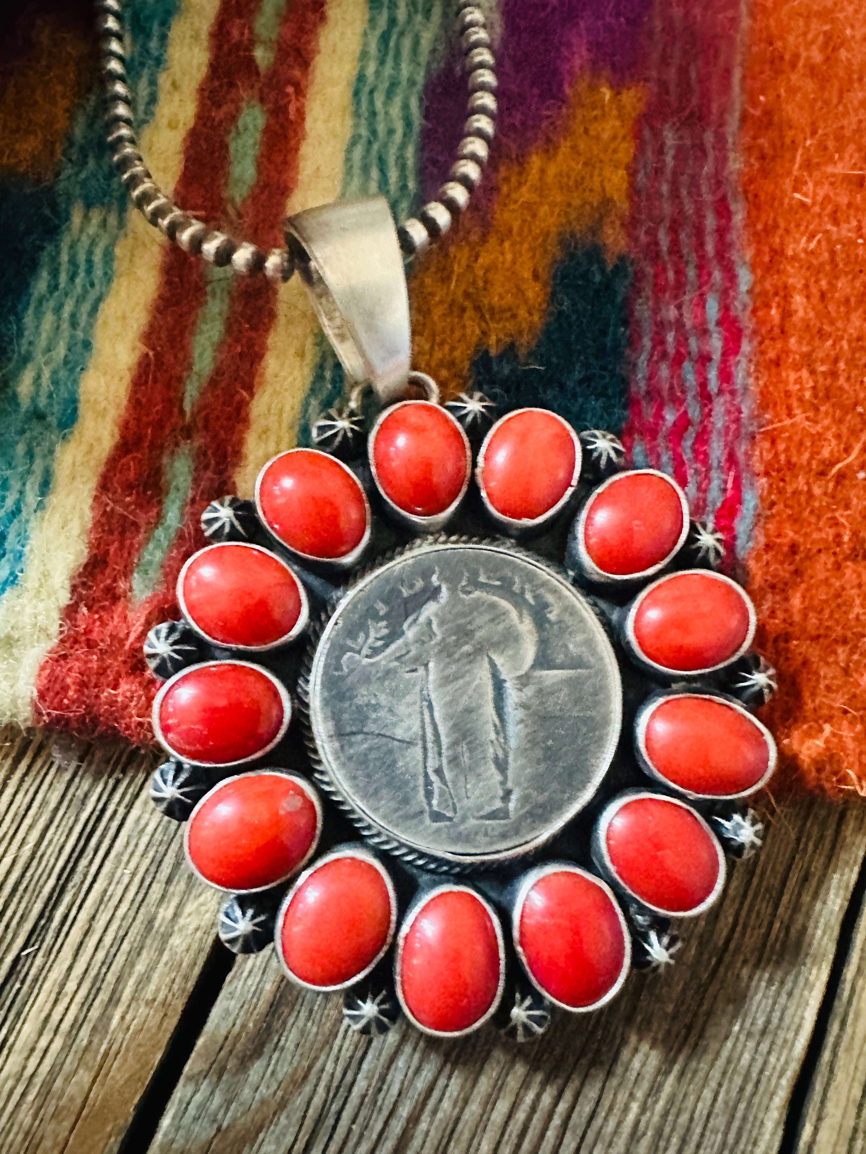 Handcrafted Sterling Silver and Coral Liberty Coin Pendant by Darrin Livingston