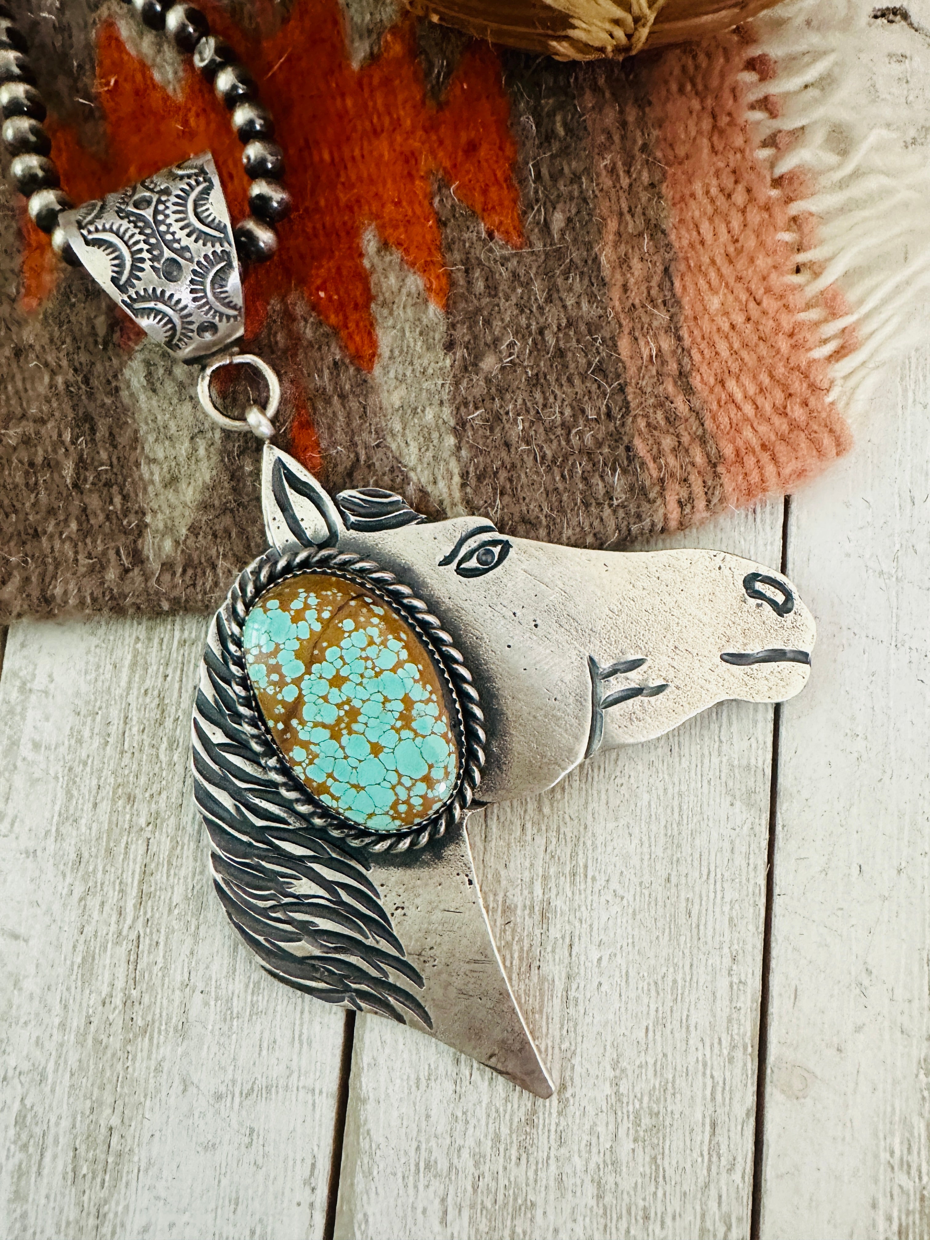 Sterling silver sold horse pendant