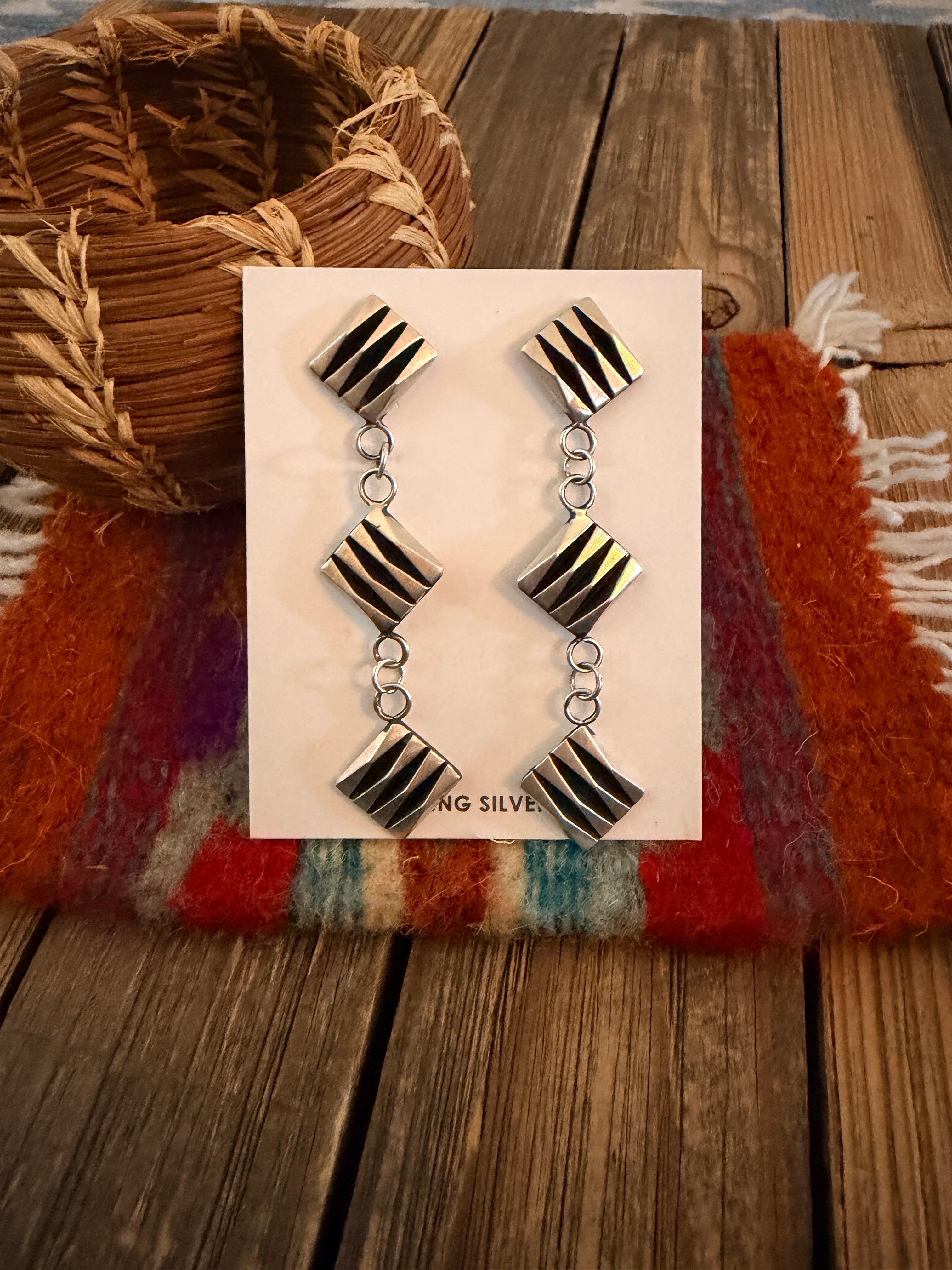 Handcrafted Sterling Silver Dangle Earrings by Leander Tahe