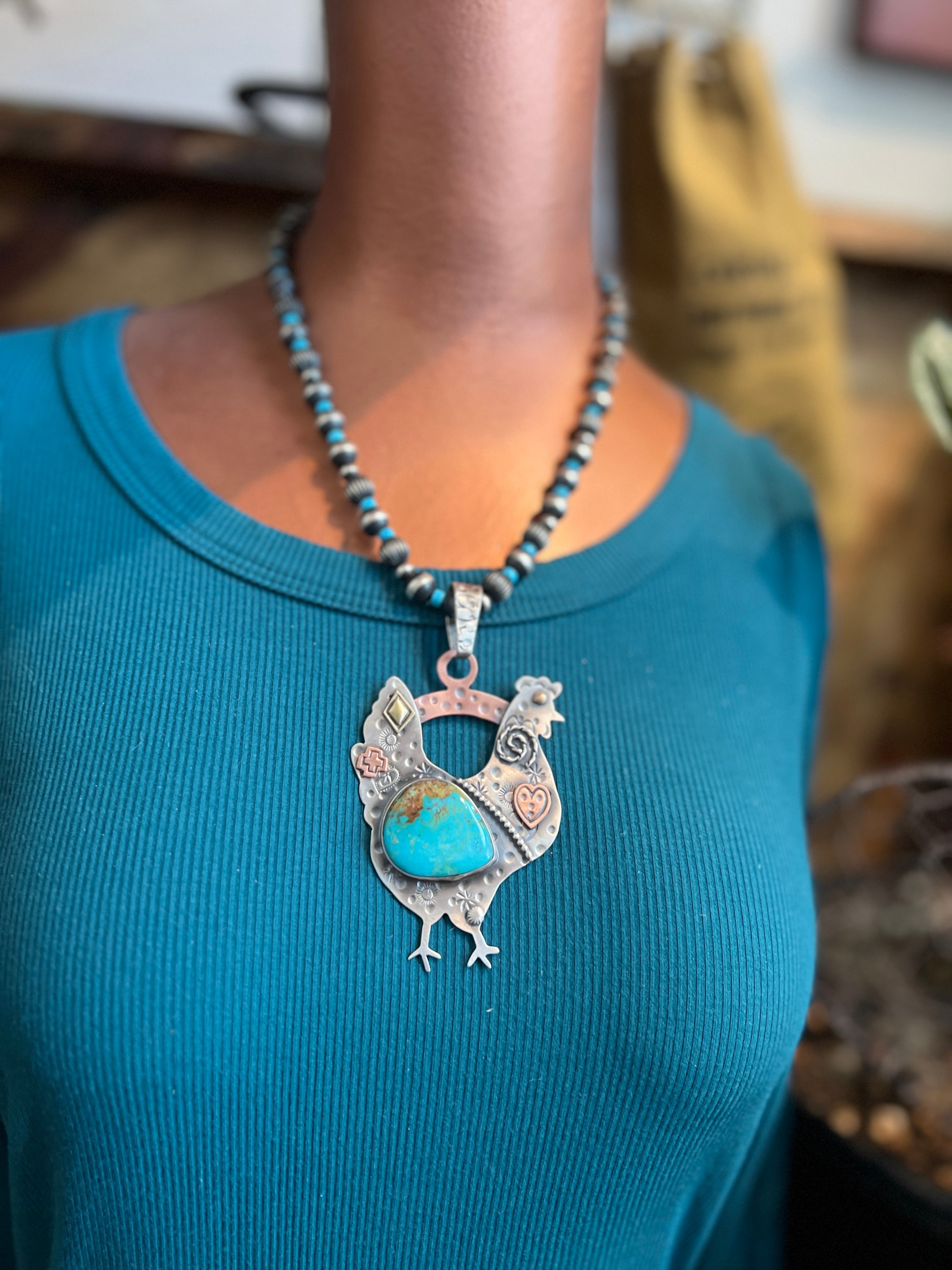 The Nizhoni Cluckers: Hand Stamped and Layered Sterling Silver, Brass, Copper & Kingman Turquoise Chicken Pendants by Kimari Somers