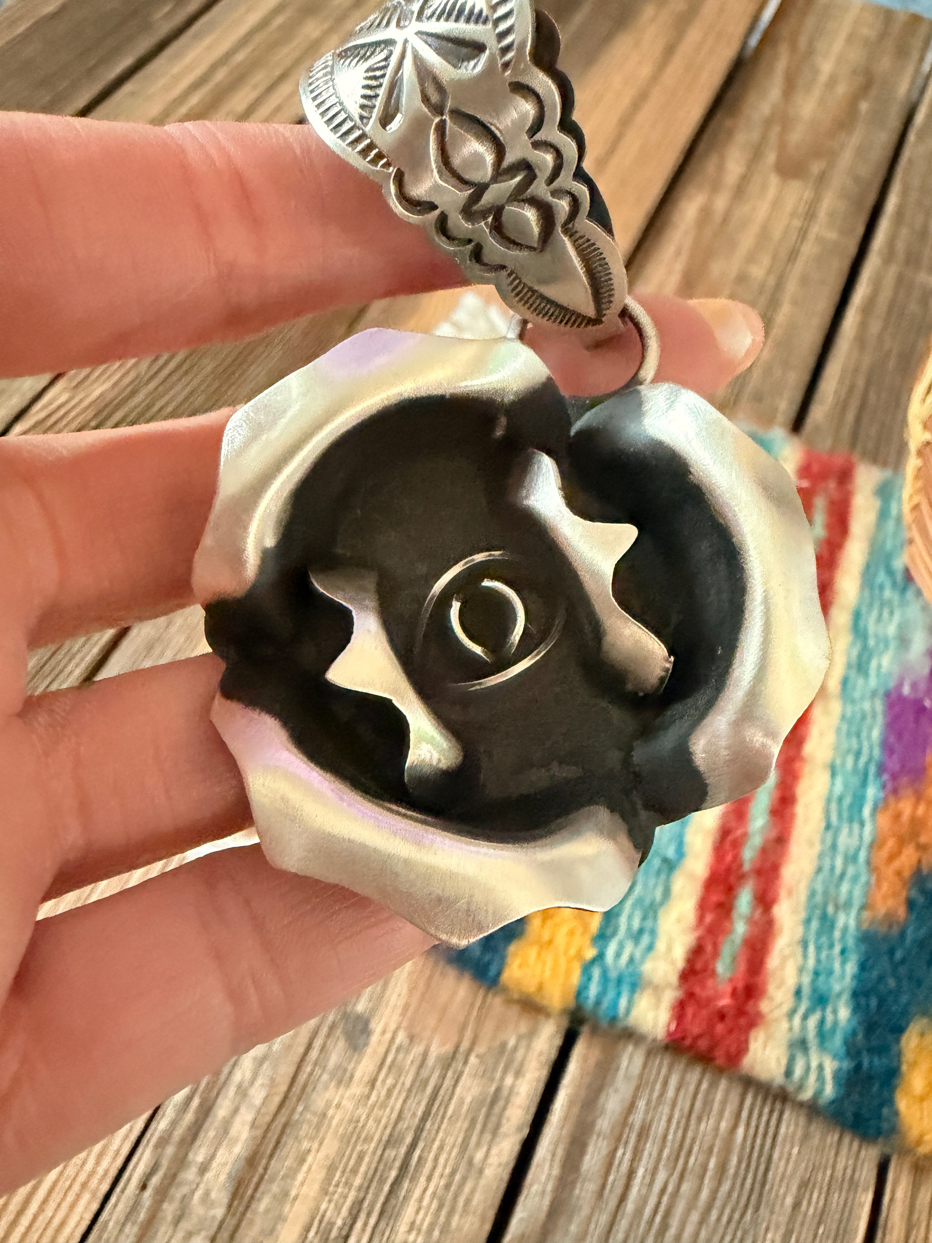 Handcrafted Sterling Silver Rose Pendant by Leander Tahe