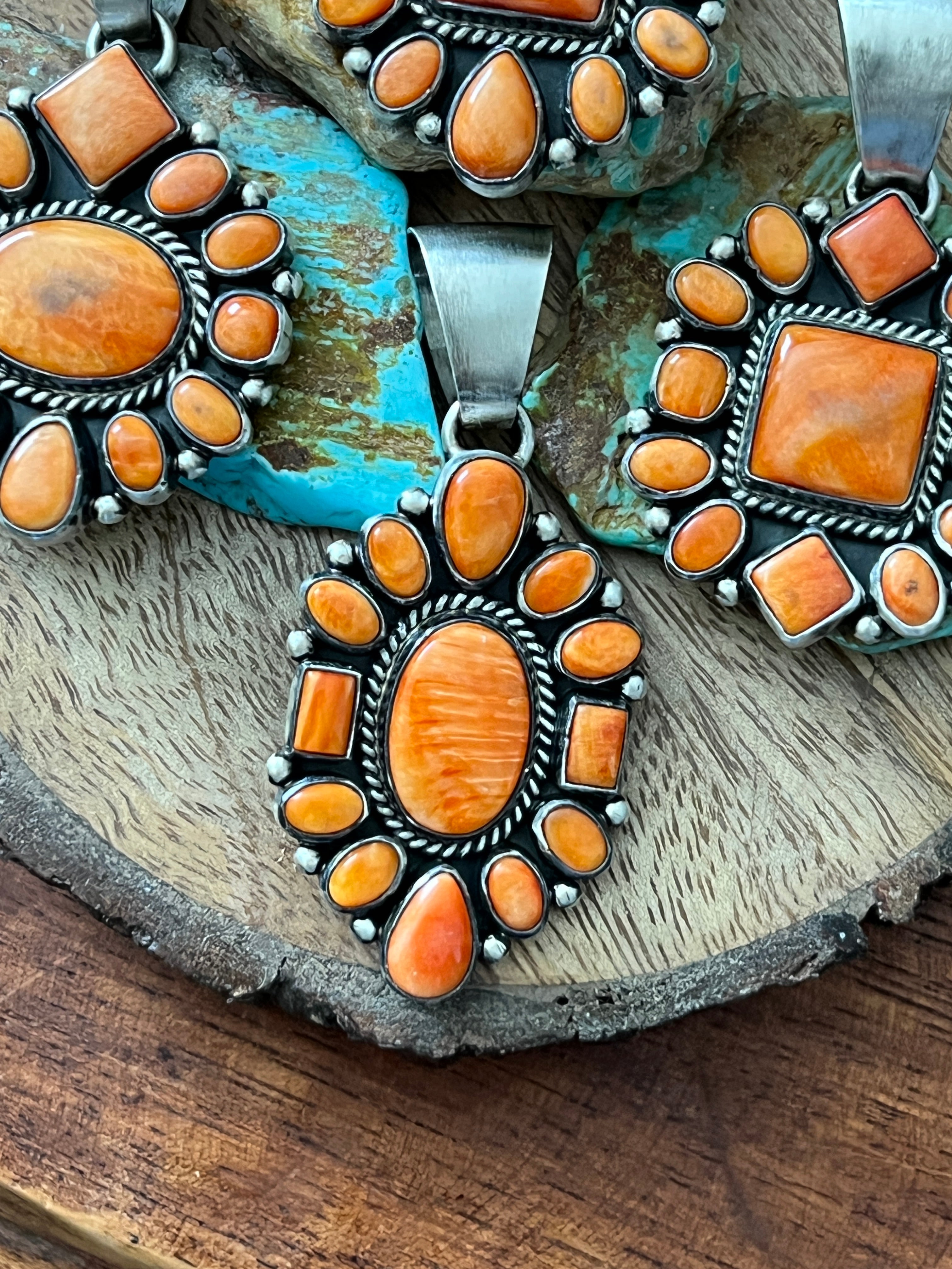 Handcrafted Sterling Silver and Burnt Spiny Oyster Shell Cluster Pendants by Loretta Delgarito