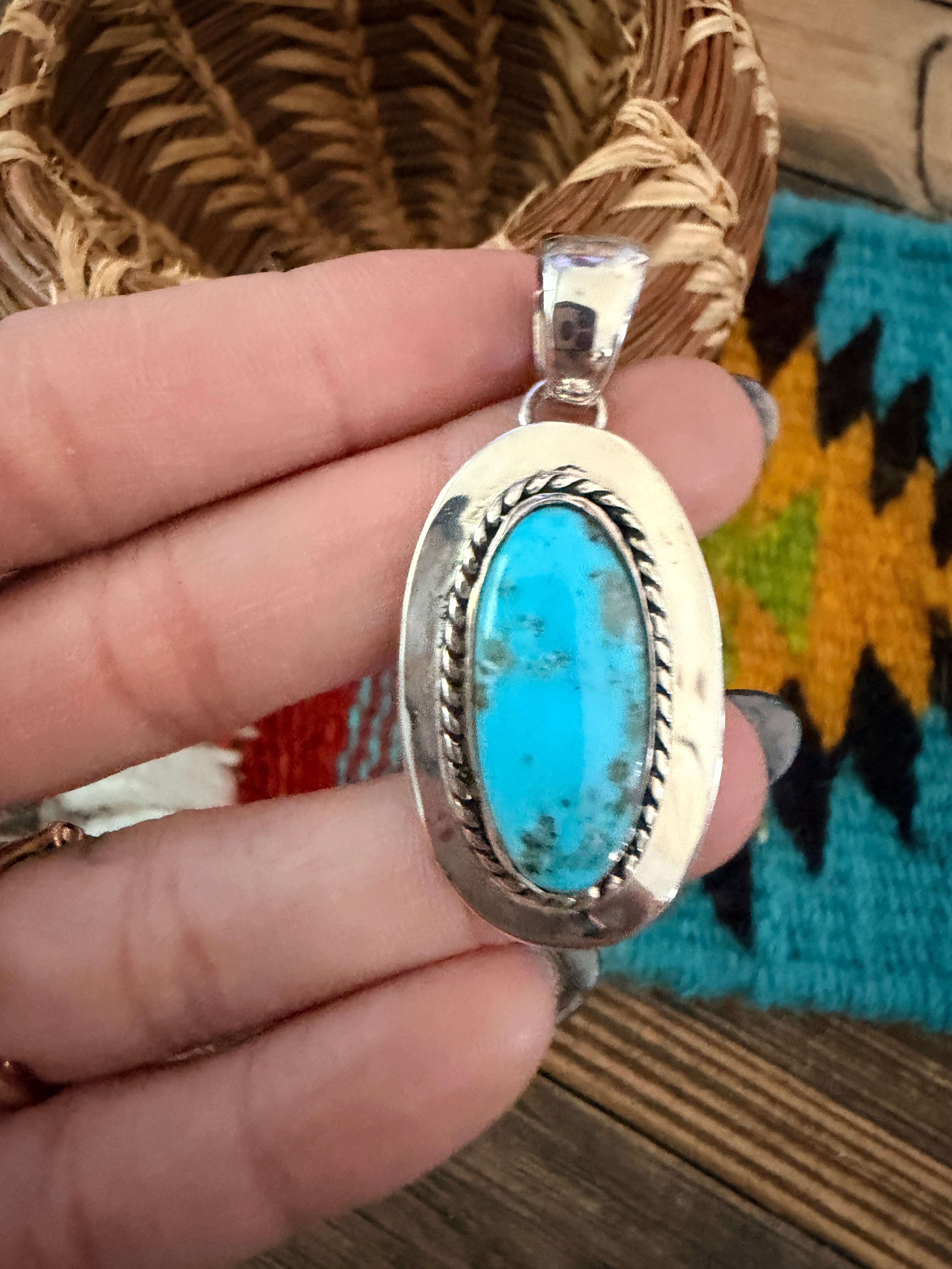 Handcrafted Sterling Silver and Turquoise Pendant by Wilford Begay