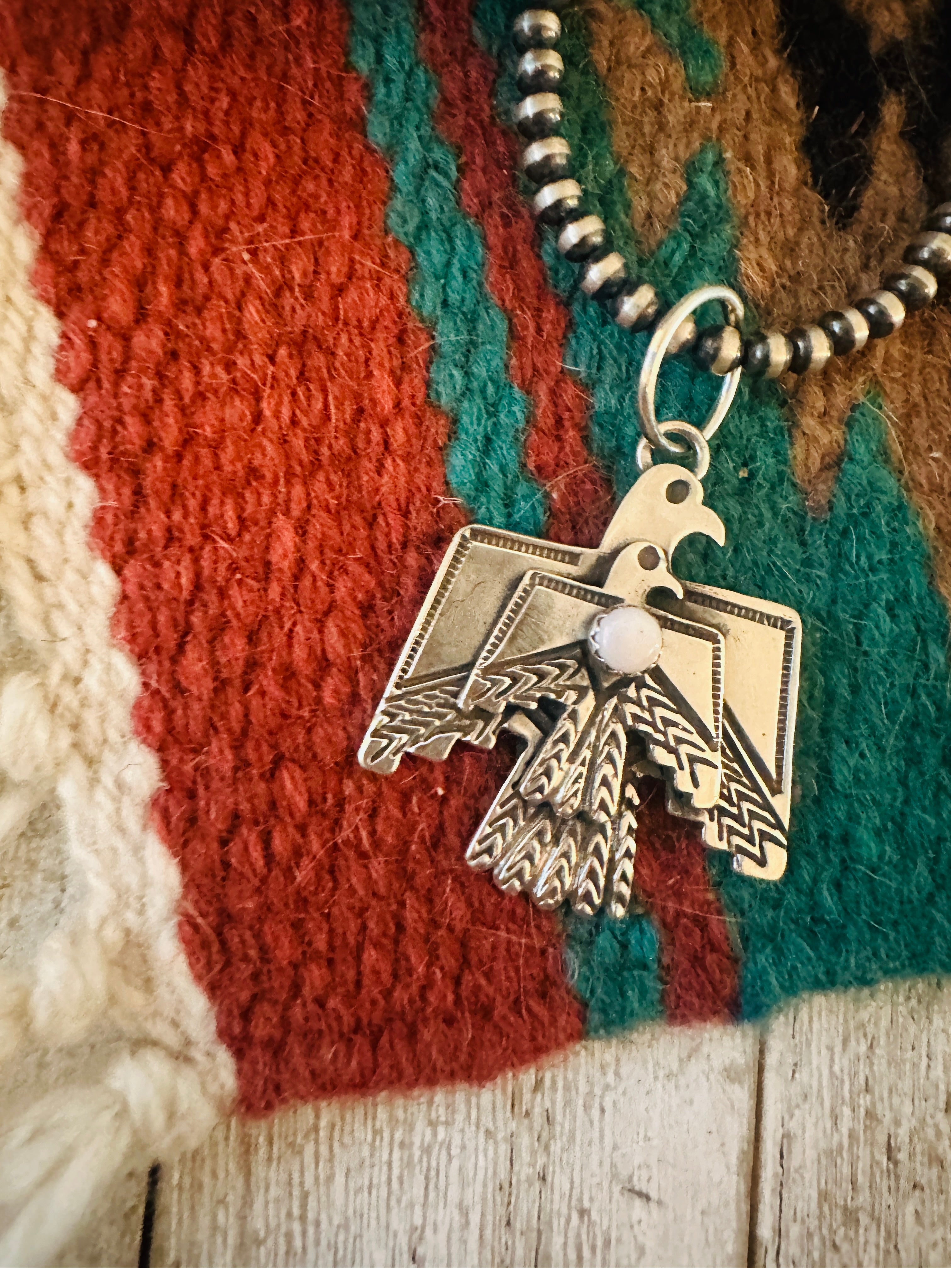 Handcrafted Sterling Silver & Queen Pink Conch Thunderbird Pendant