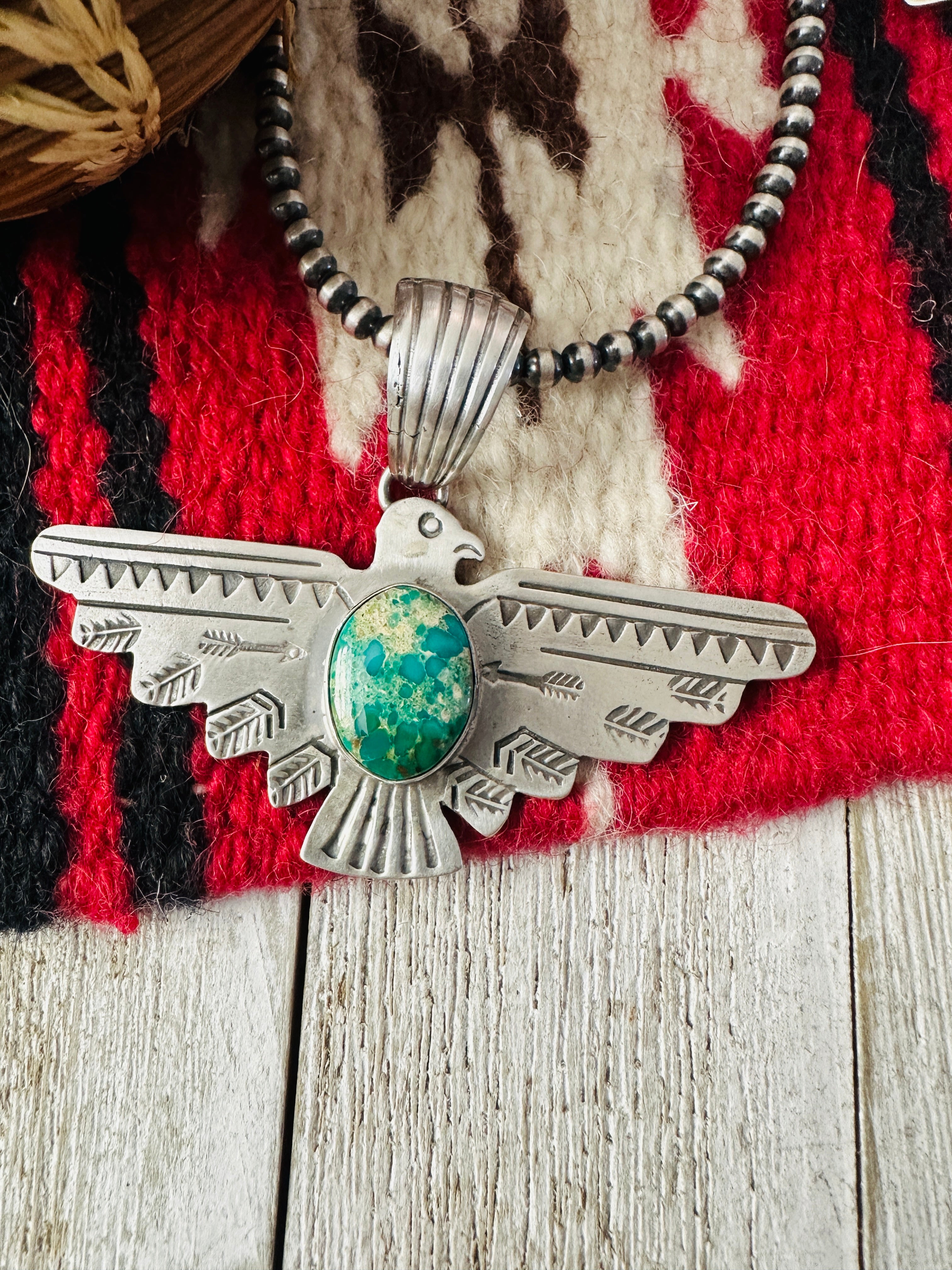 Sterling Silver & Turquoise Thunderbird Pendant by Russell Sam