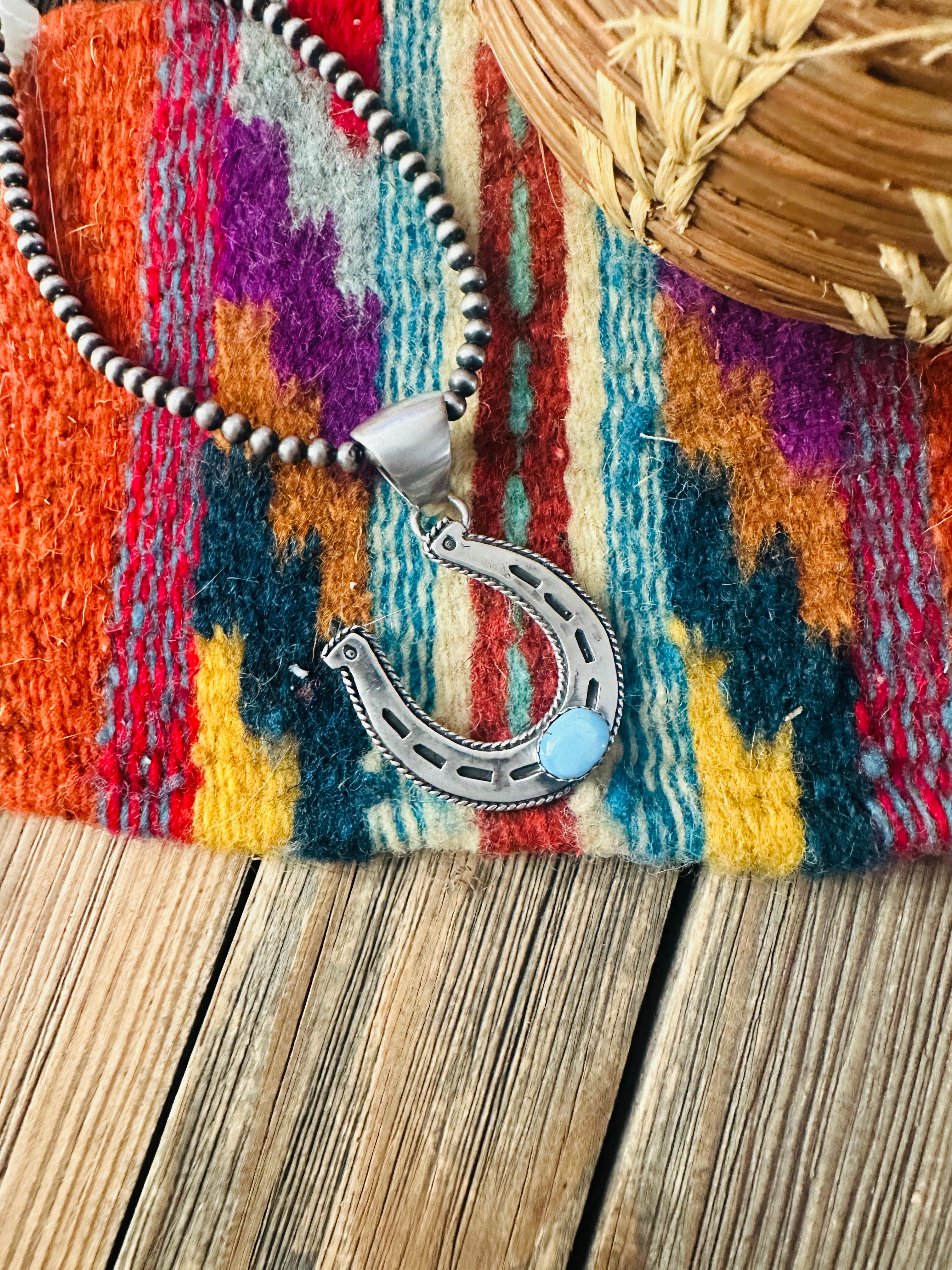 Handcrafted Sterling Silver and Golden Hills Turquoise Horseshoe Pendant