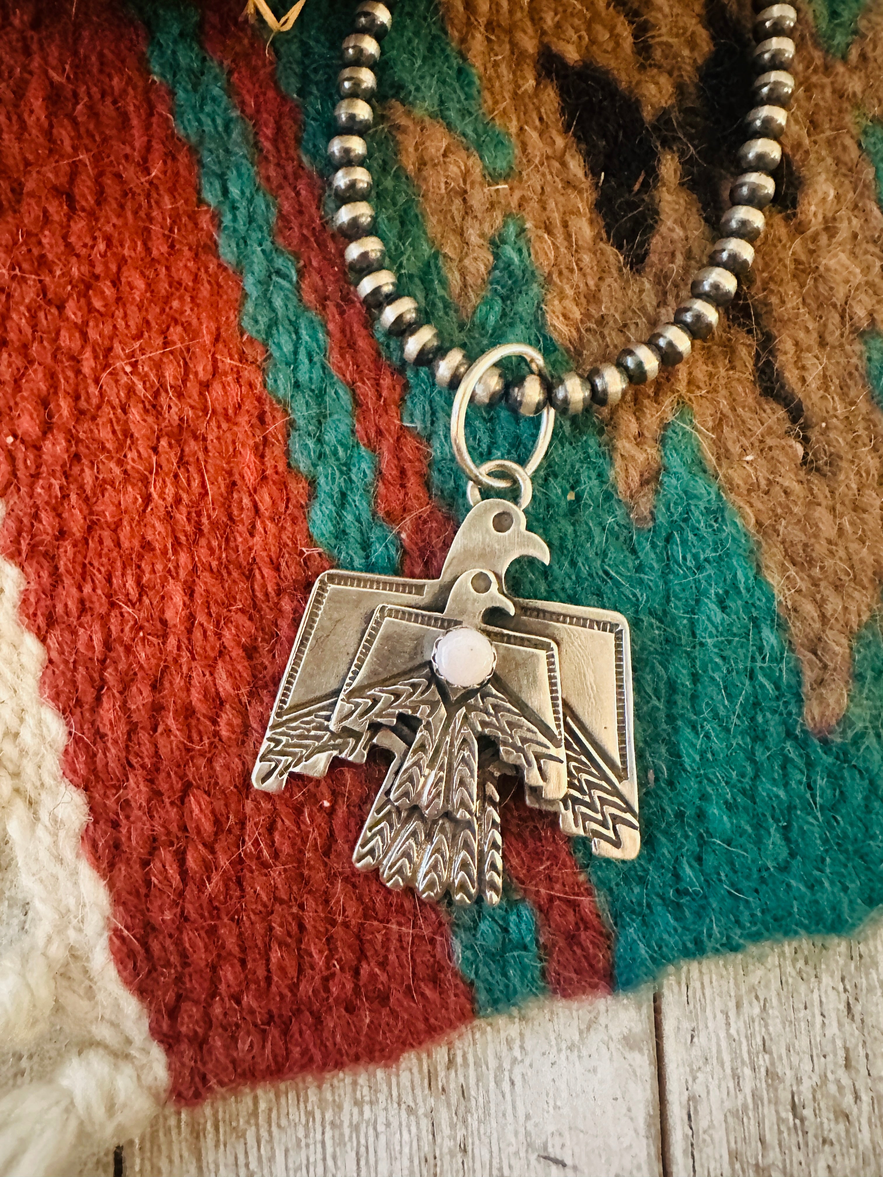 Handcrafted Sterling Silver & Queen Pink Conch Thunderbird Pendant