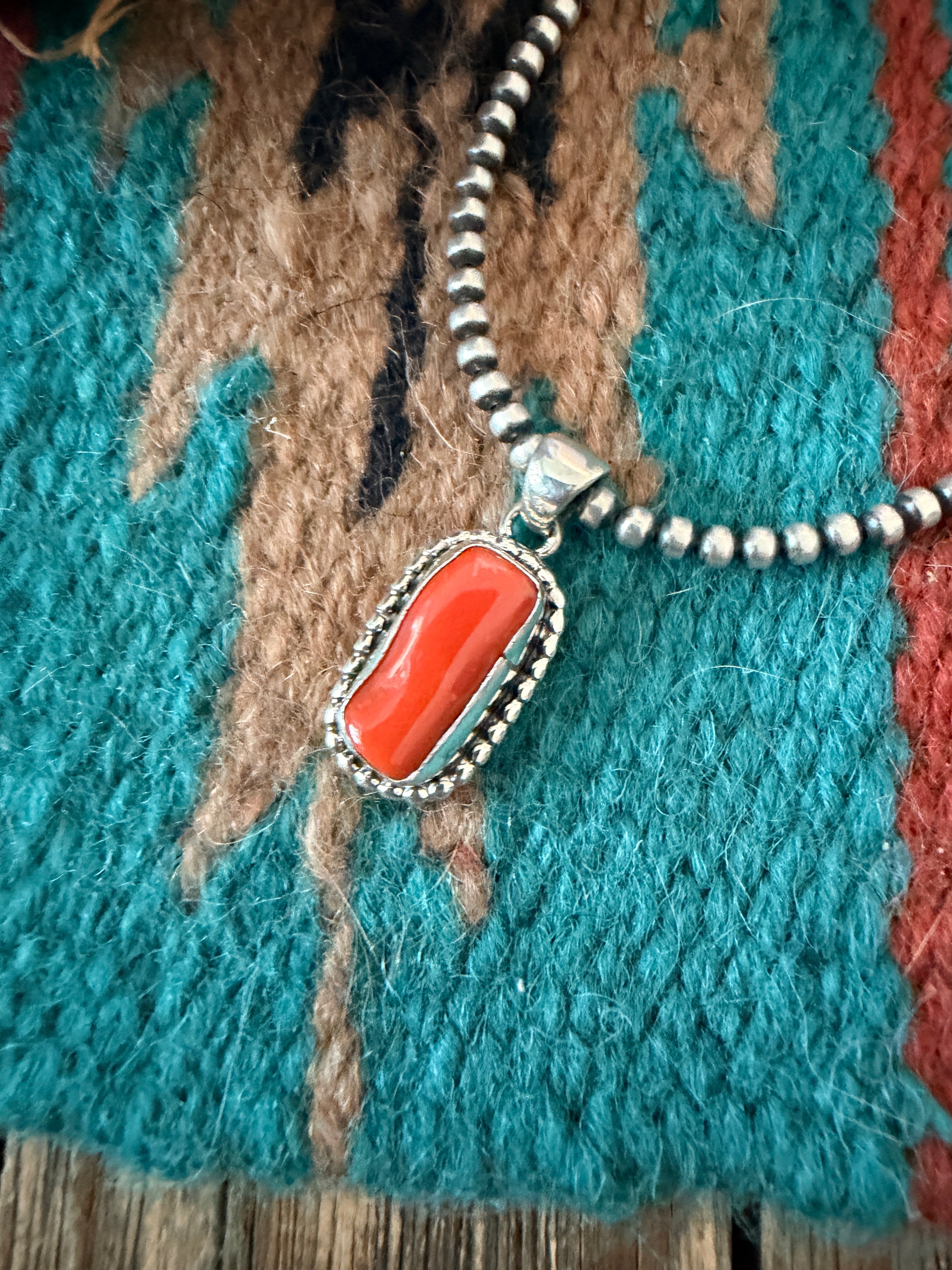 Handcrafted Sterling Silver & Coral Pendant by Patrick Skeets