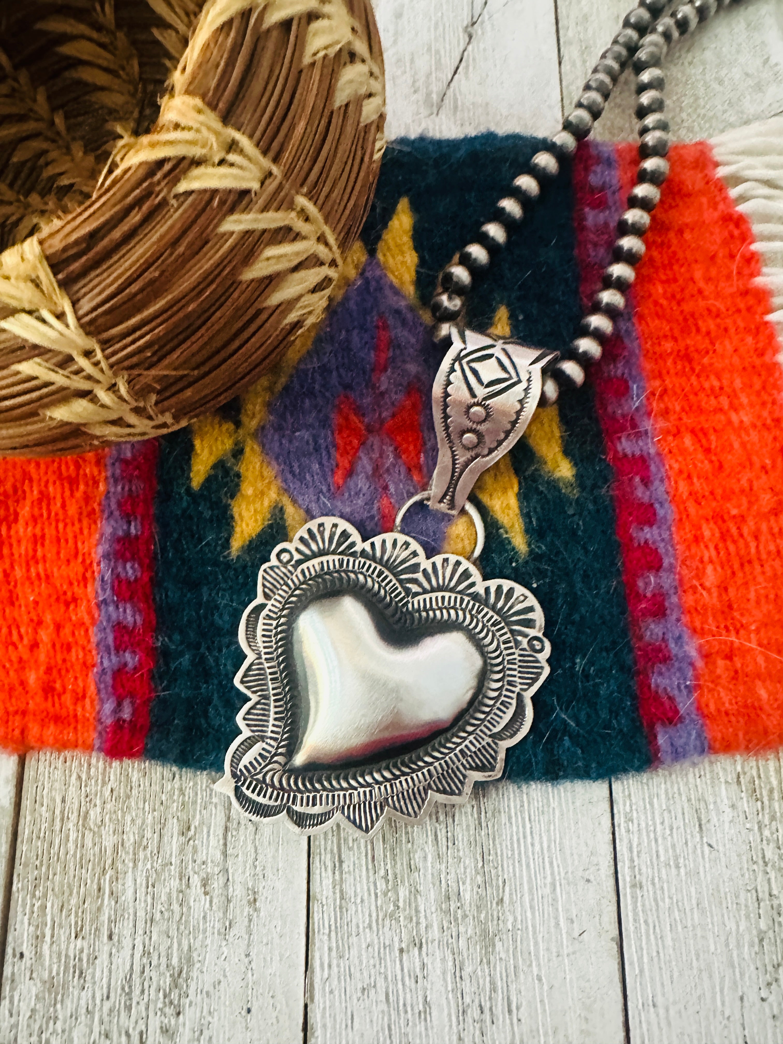 Handcrafted Sterling Silver Heart Concho Pendant by Leander Tahe