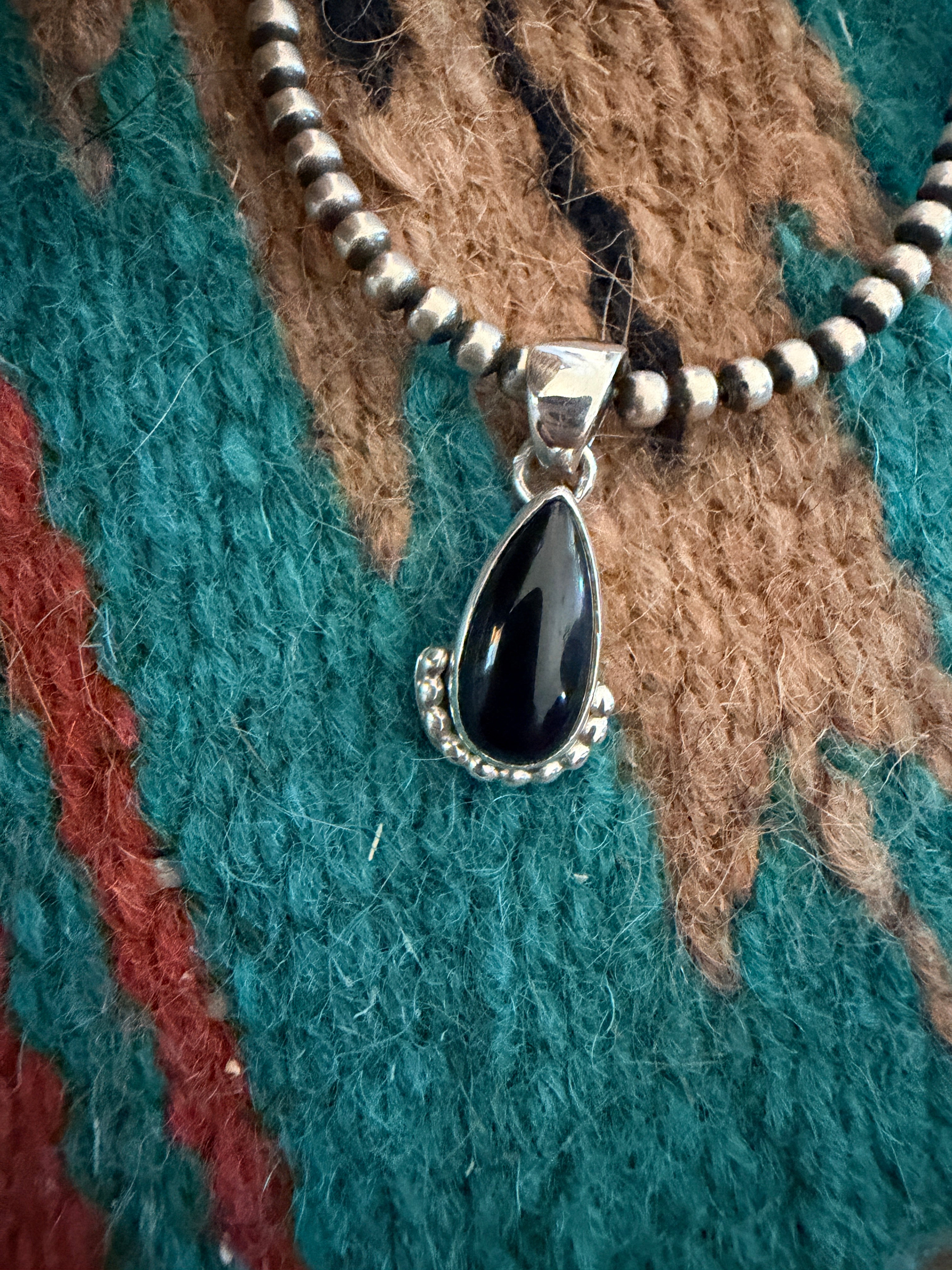Handcrafted Sterling Silver and Black Onyx Pendant