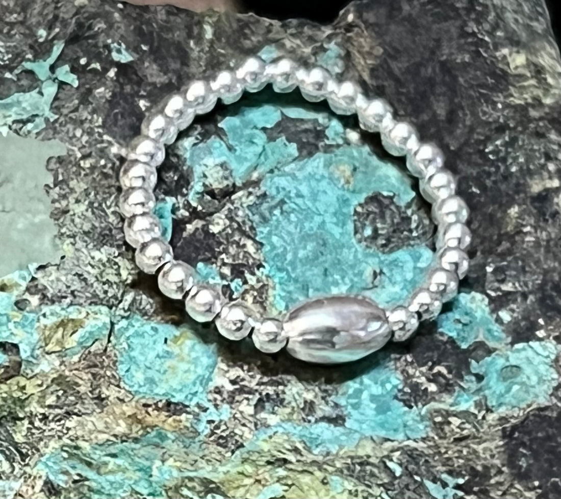 Beaded Stretch Ring With Center Ellipse