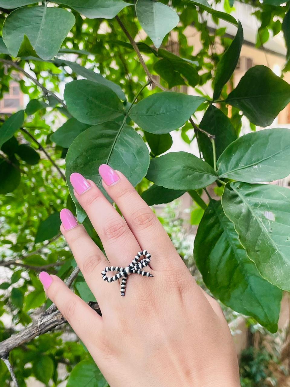 The Sterling Silver Bow Tie Handmade Sterling Silver Navajo Pearl Style Beaded Stretch Ring