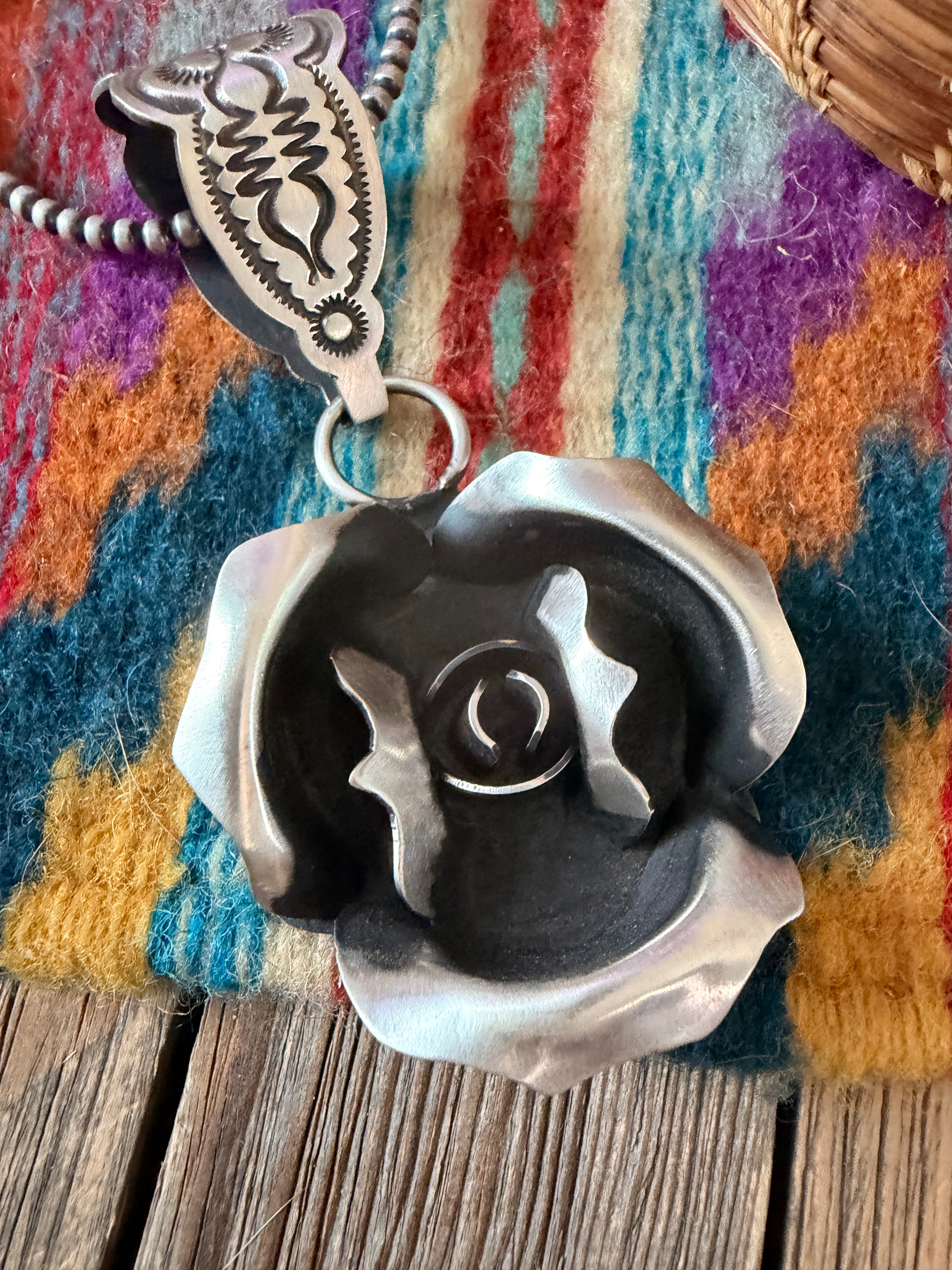 Handcrafted Sterling Silver Rose Pendant by Leander Tahe