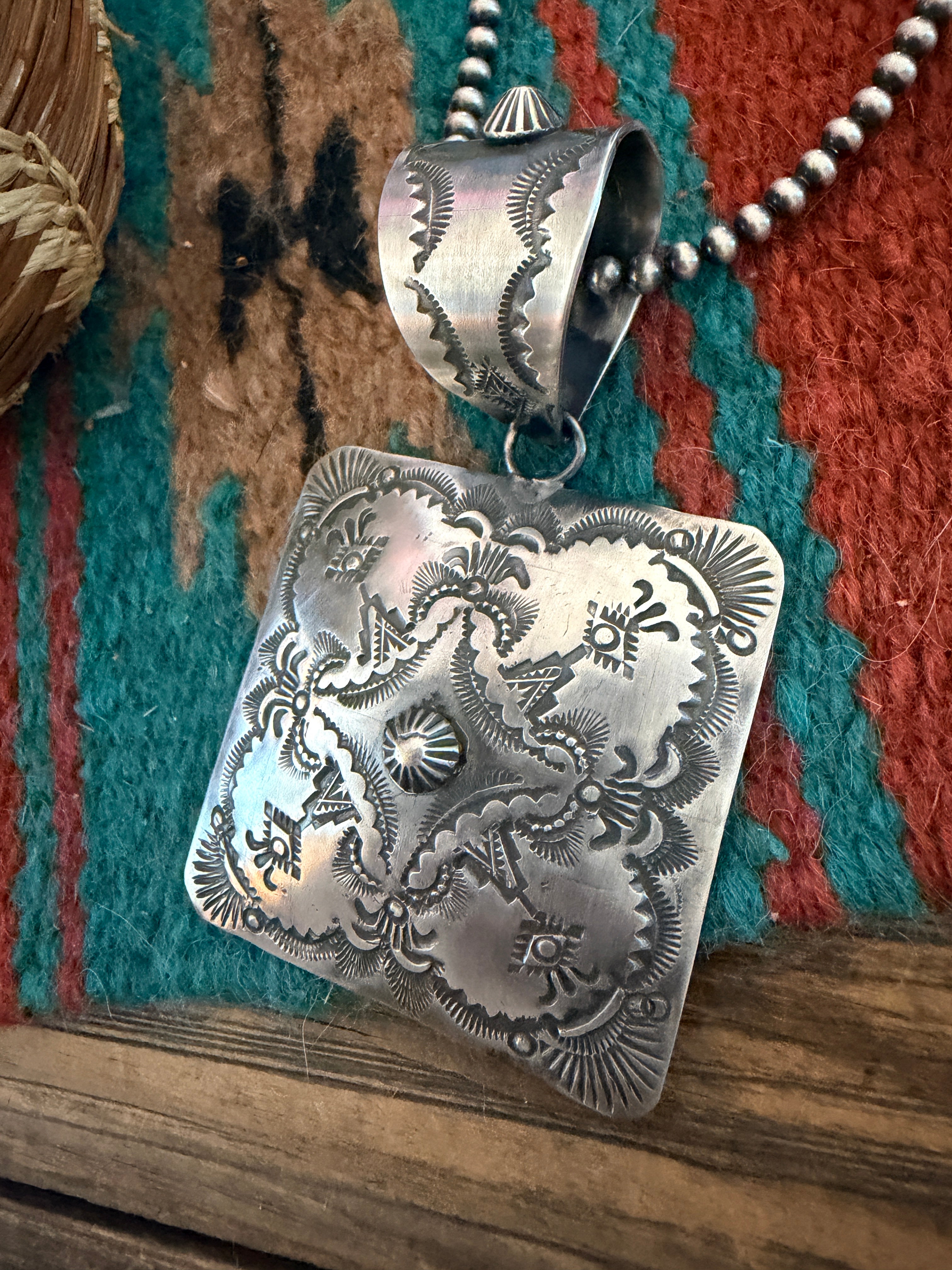 Handcrafted Sterling Silver Concho Pendant by Vincent Platero