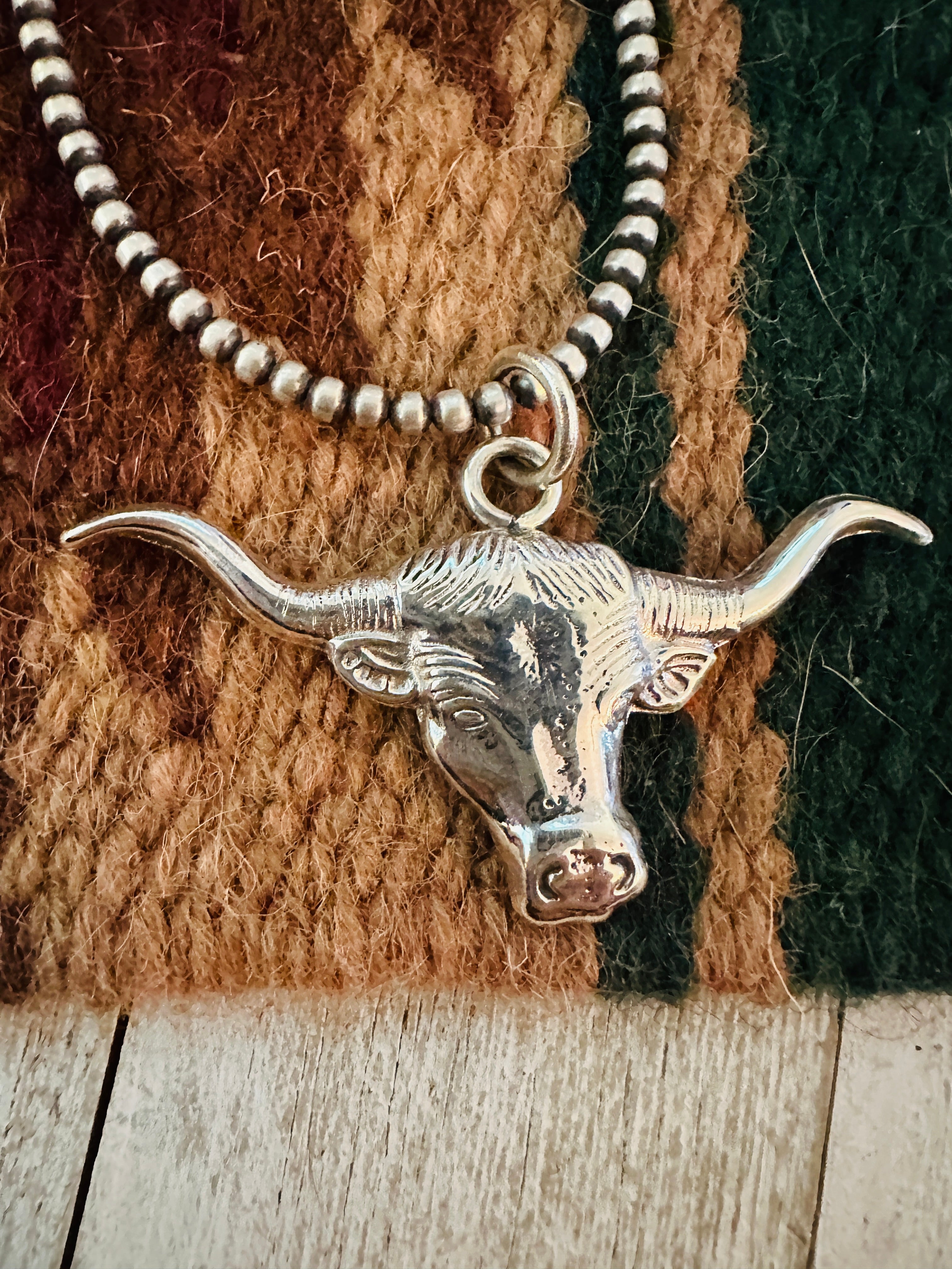 Navajo Sterling Silver Bullhead Pendant