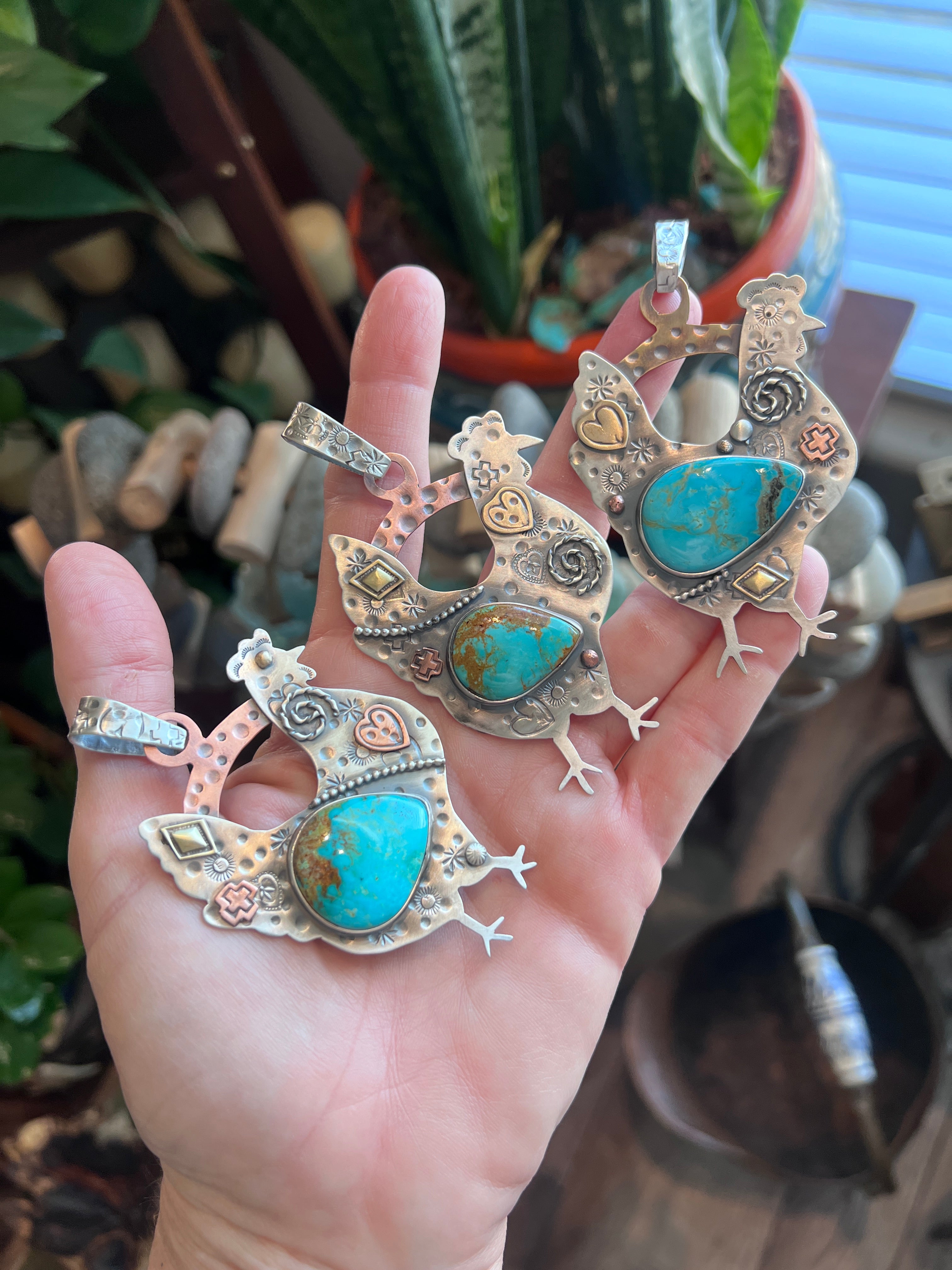 The Nizhoni Cluckers: Hand Stamped and Layered Sterling Silver, Brass, Copper & Kingman Turquoise Chicken Pendants by Kimari Somers