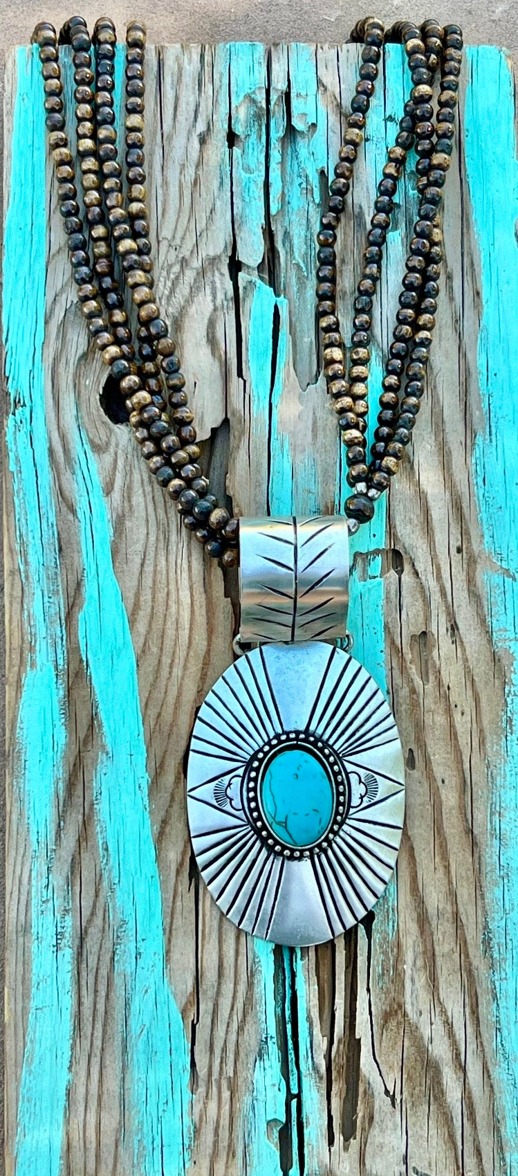 Silver-Plated Brass Pendant on Brown Beaded Necklace