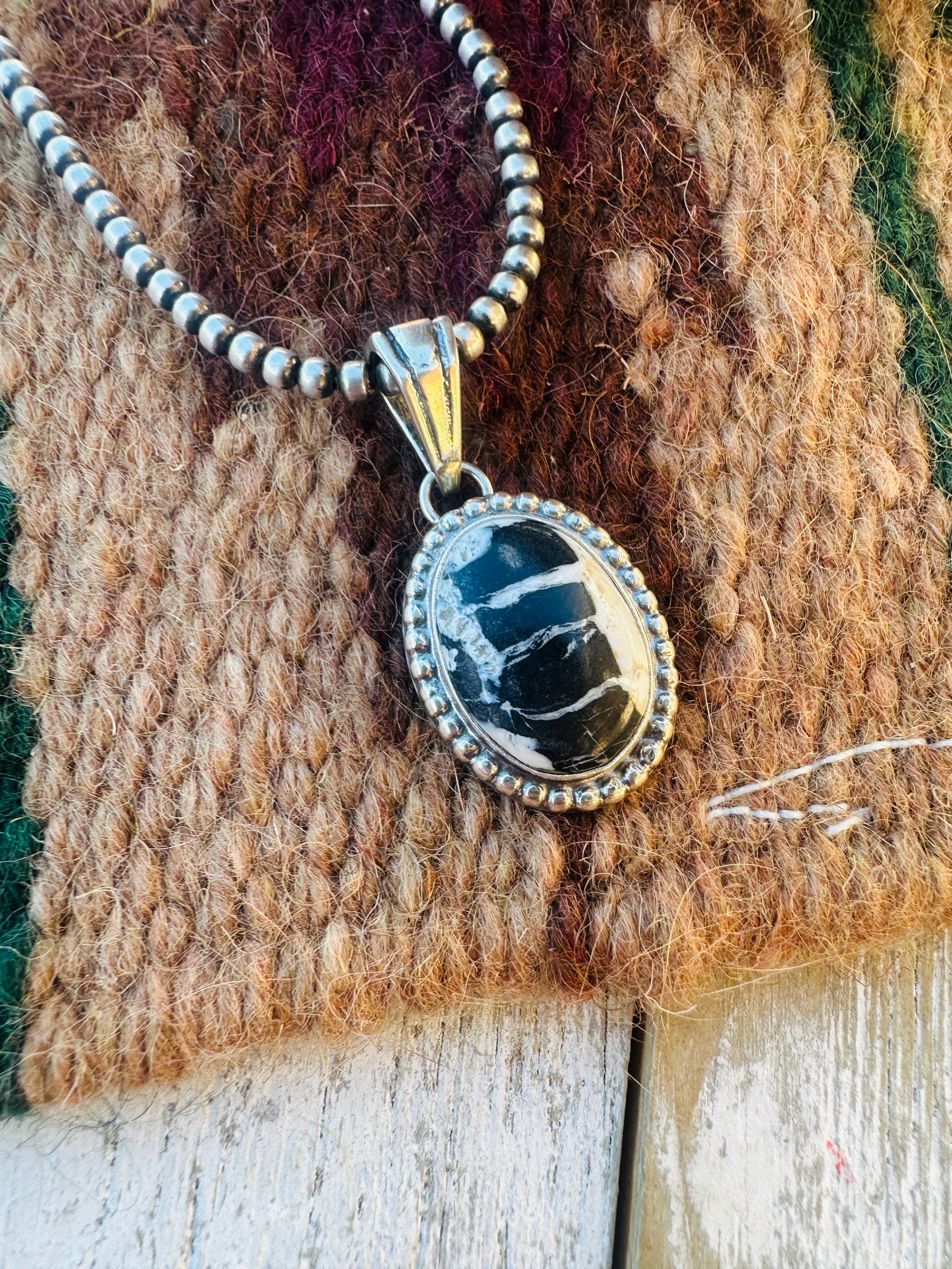 Handcrafted Sterling Silver White Buffalo Pendant