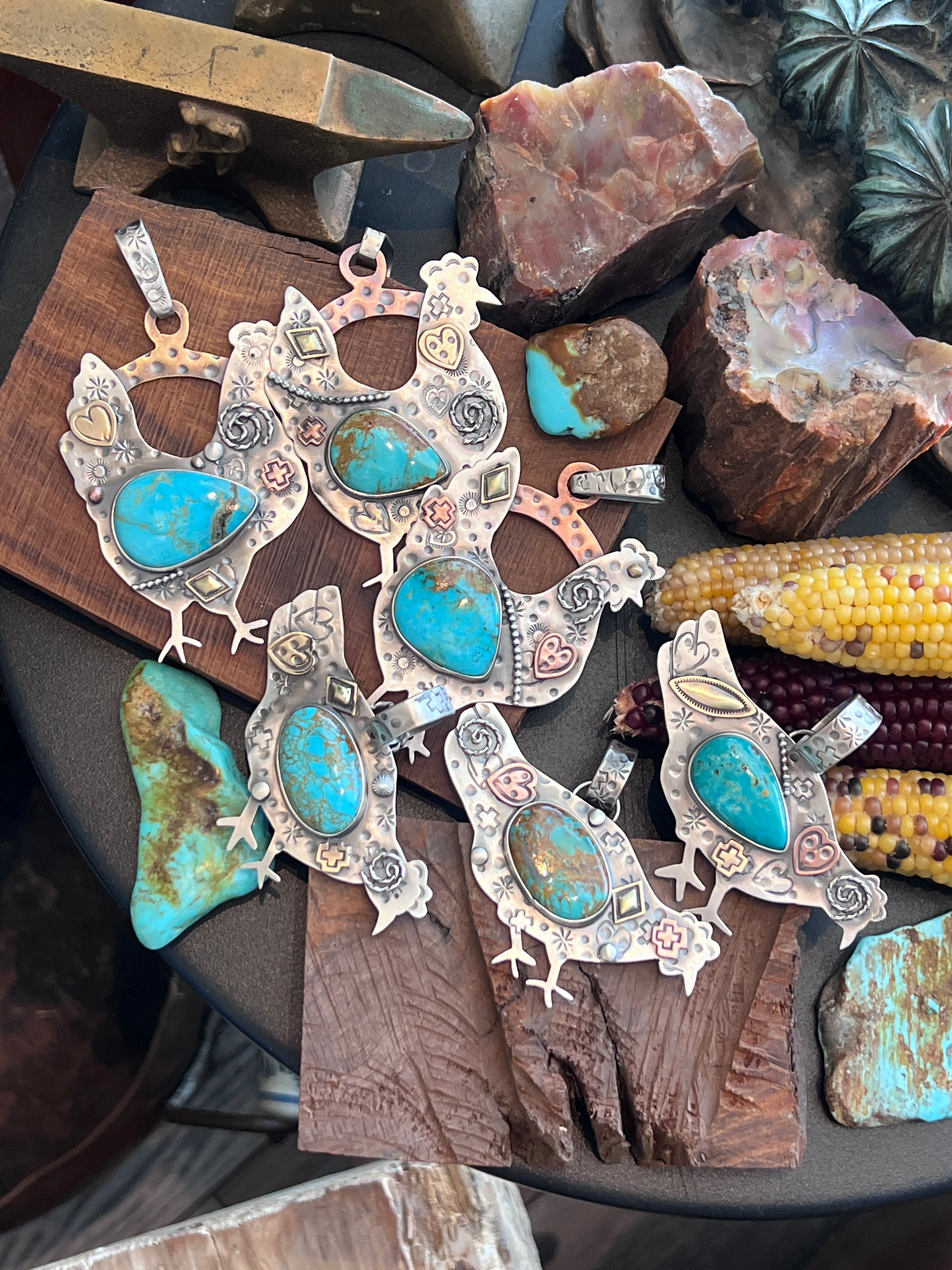 The Nizhoni Cluckers: Hand Stamped and Layered Sterling Silver, Brass, Copper & Kingman Turquoise Chicken Pendants by Kimari Somers
