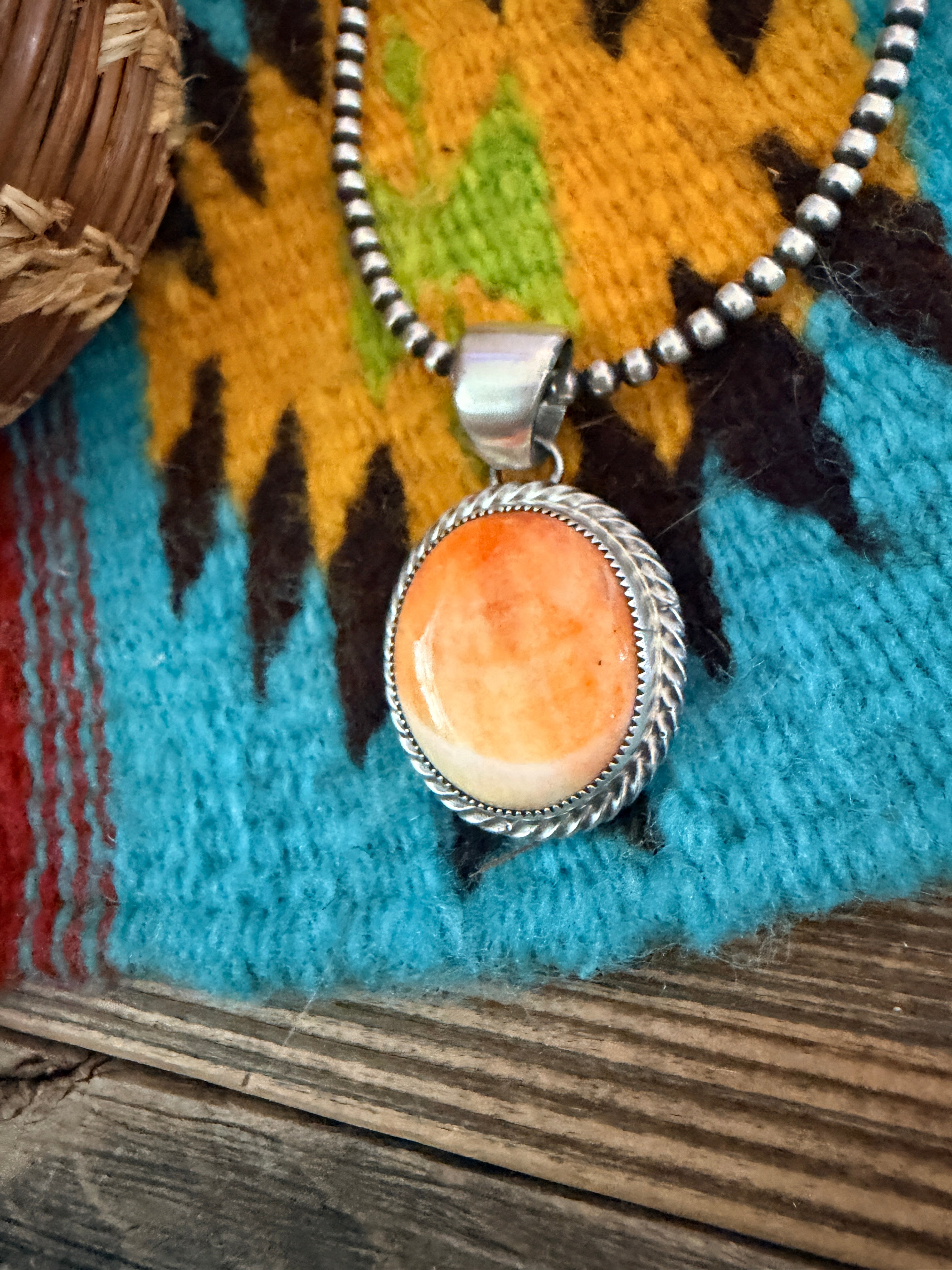 Handcrafted Sterling Silver and Spiny Oyster Pendant