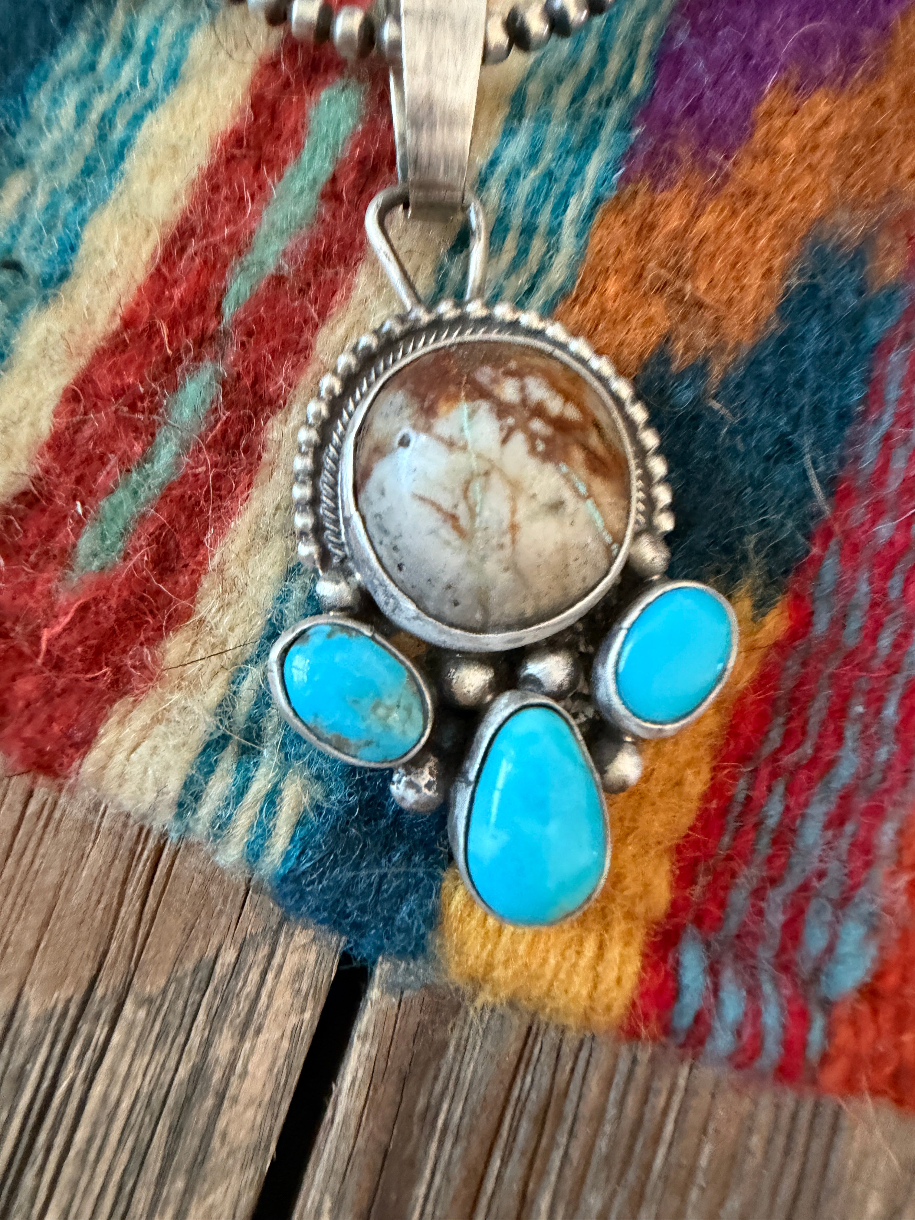 Handcrafted Sterling Silver & Turquoise Pendant by Travis Jim