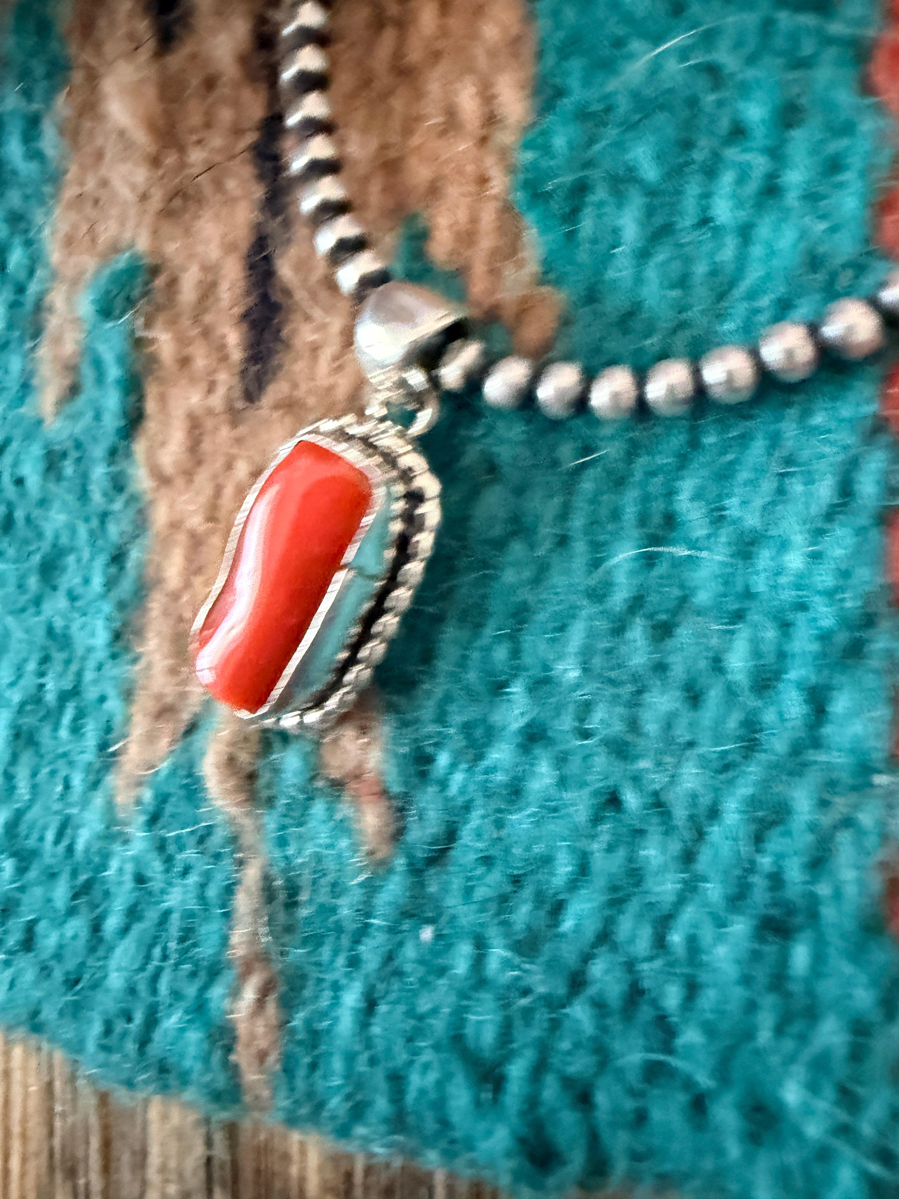 Handcrafted Sterling Silver & Coral Pendant by Patrick Skeets