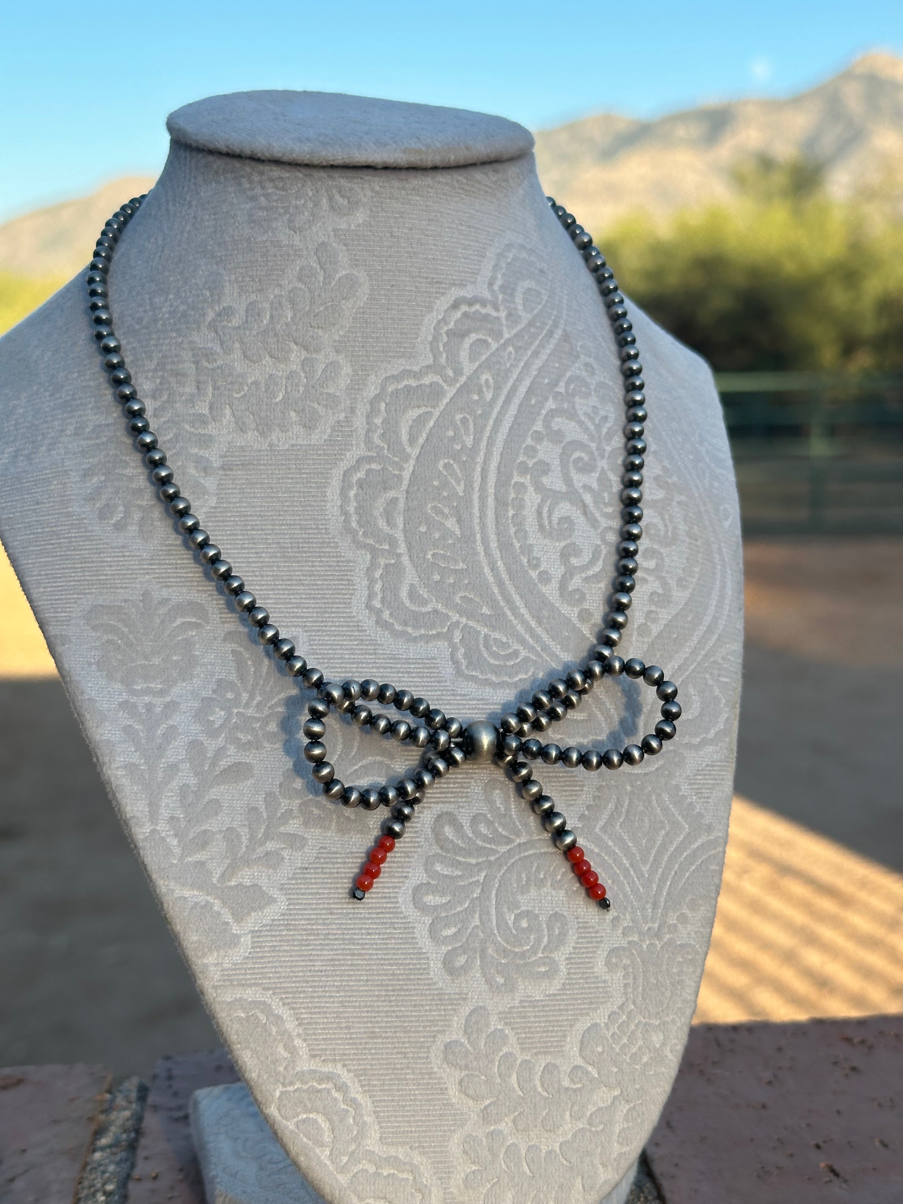 Pearl bow tie necklace store
