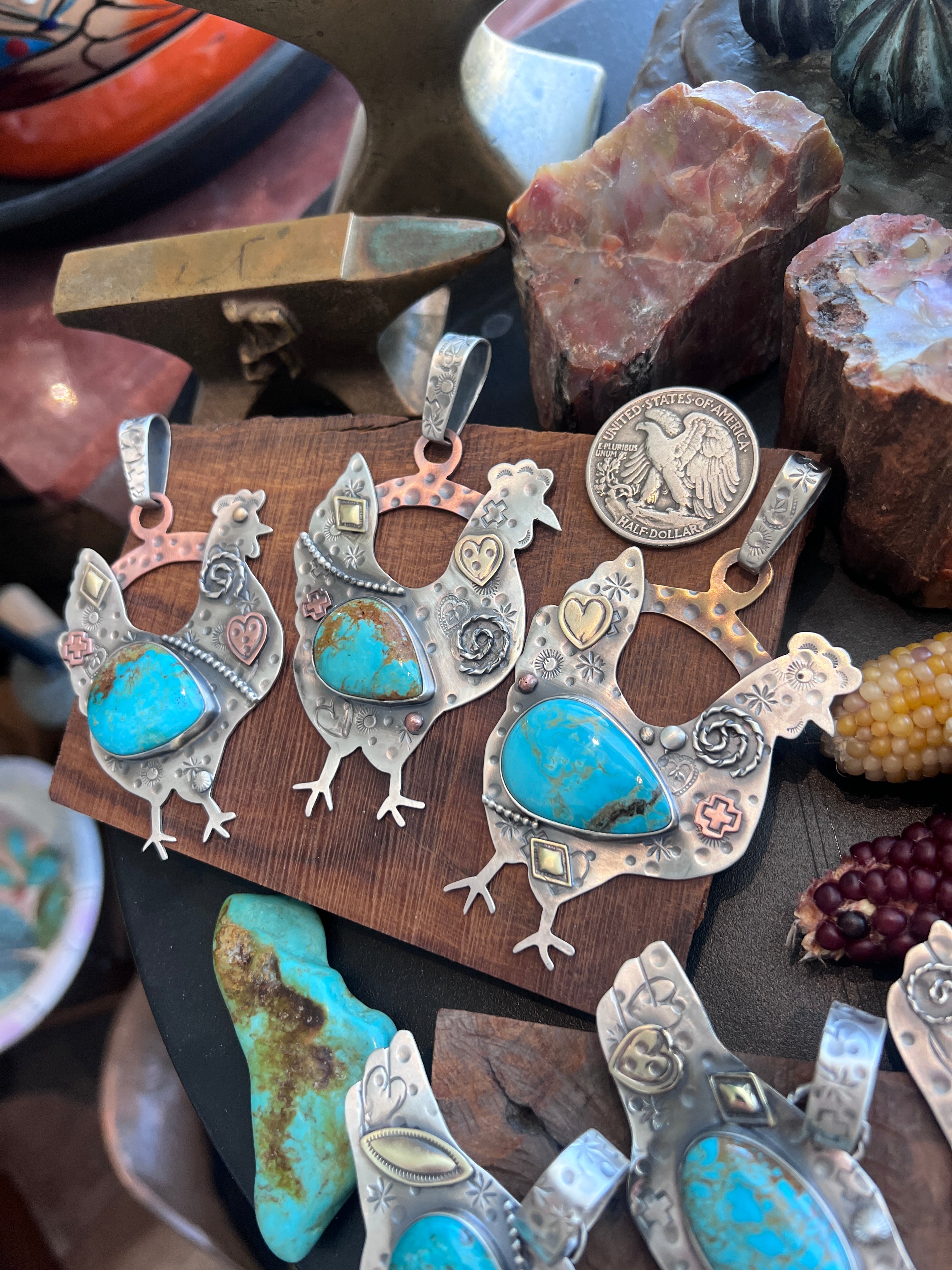 The Nizhoni Cluckers: Hand Stamped and Layered Sterling Silver, Brass, Copper & Kingman Turquoise Chicken Pendants by Kimari Somers
