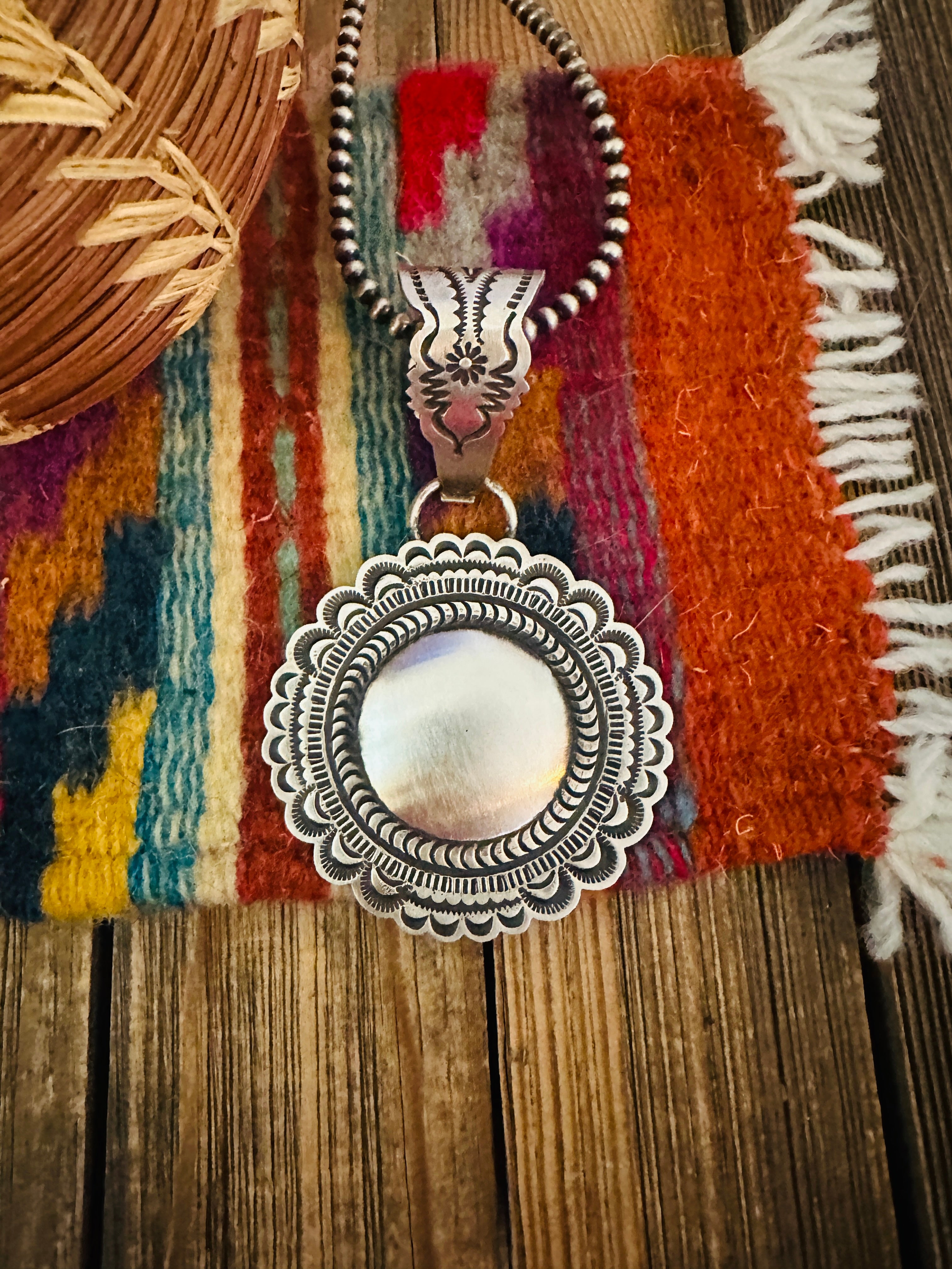 Handcrafted Sterling Silver Concho Pendant by Leander Tahe