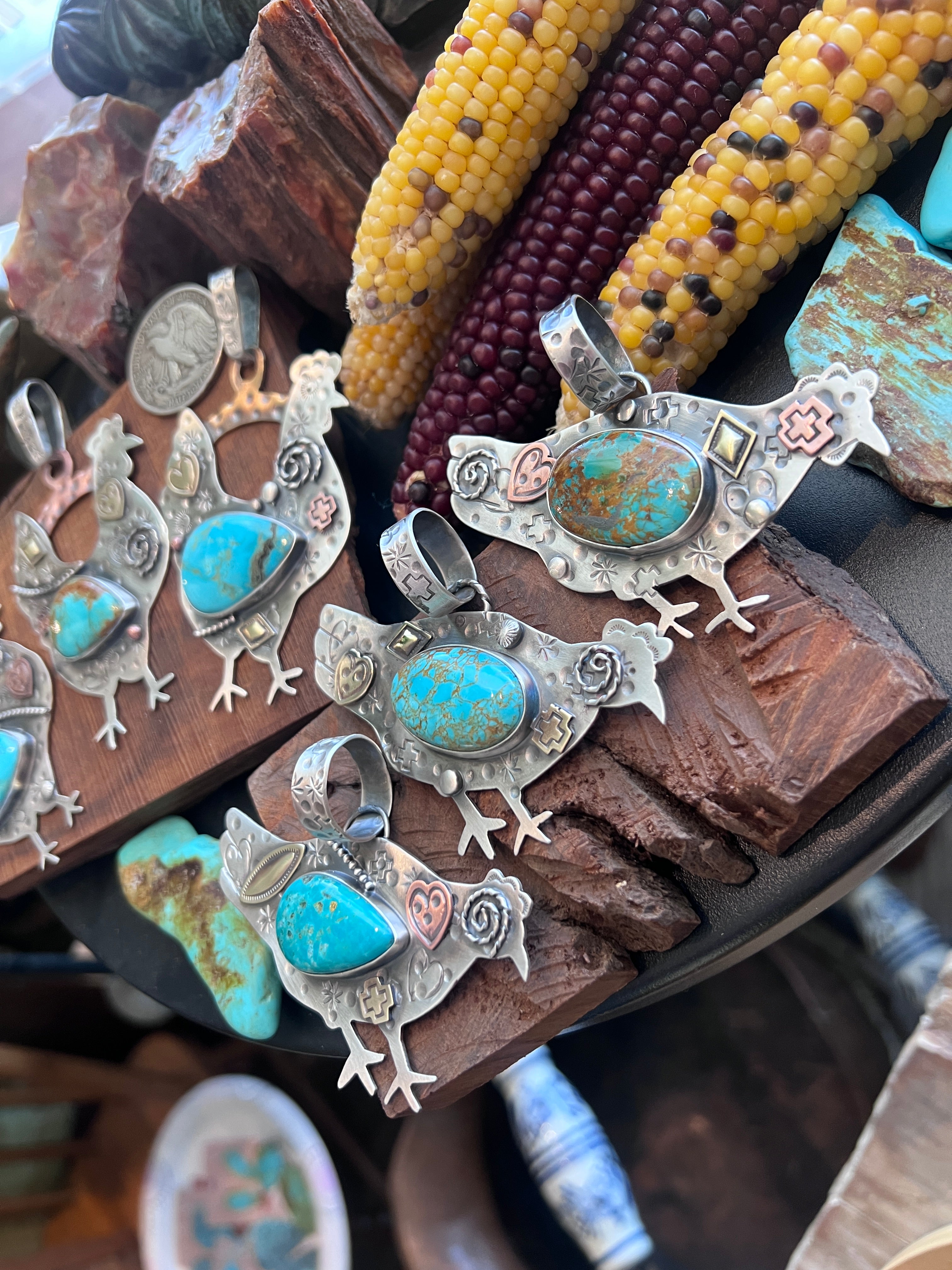 The Nizhoni Cluckers: Hand Stamped and Layered Sterling Silver, Brass, Copper & Kingman Turquoise Chicken Pendants by Kimari Somers