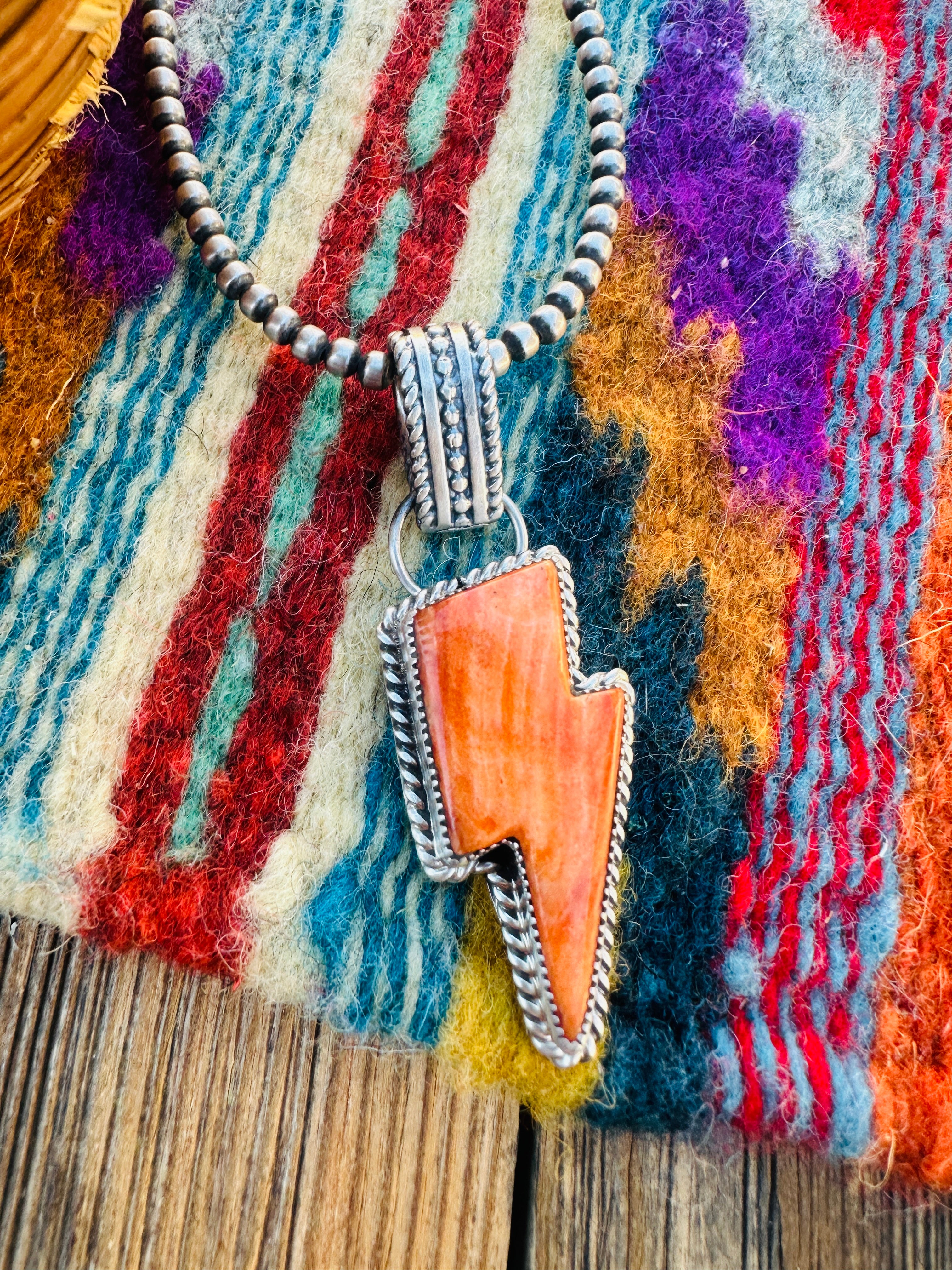 Handcrafted Spiny Oyster & Sterling Silver Lightning Bolt Pendant by Tatum Skeets