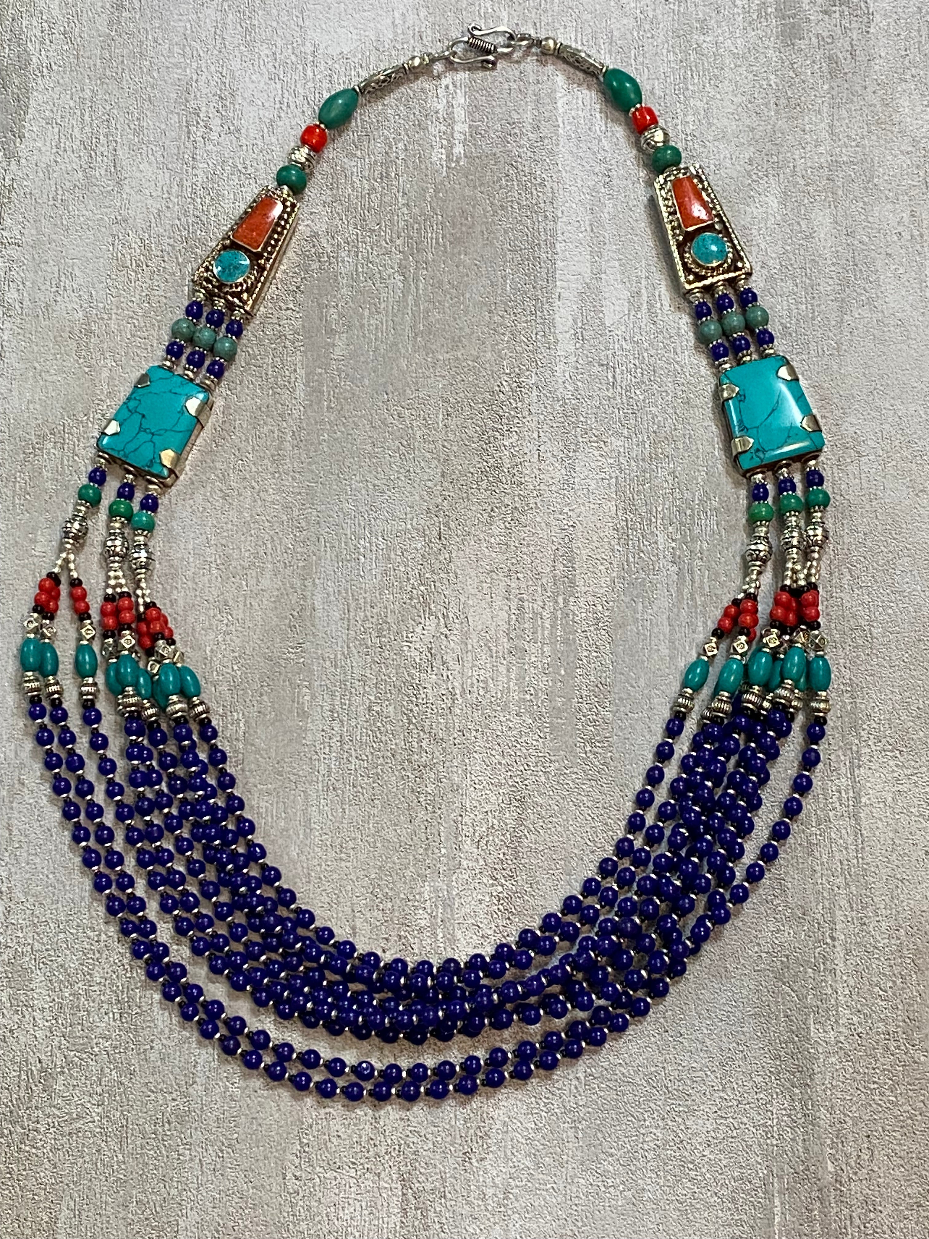 Silver Plated Tibetan Style Nine Strand Turquoise, Red Coral, & Blue Lapis Beaded Necklace