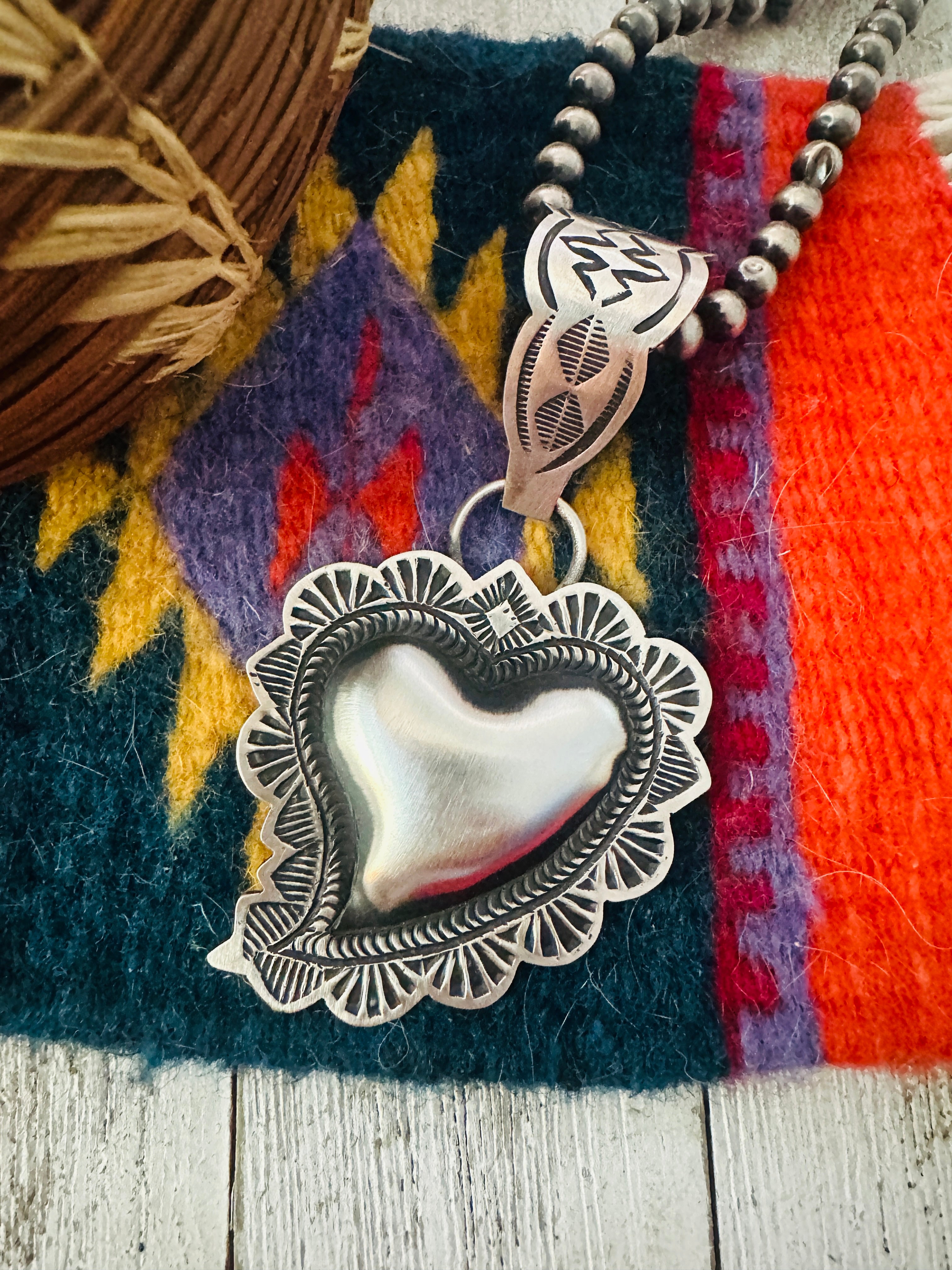 Handcrafted Sterling Silver Heart Concho Pendant by Leander Tahe