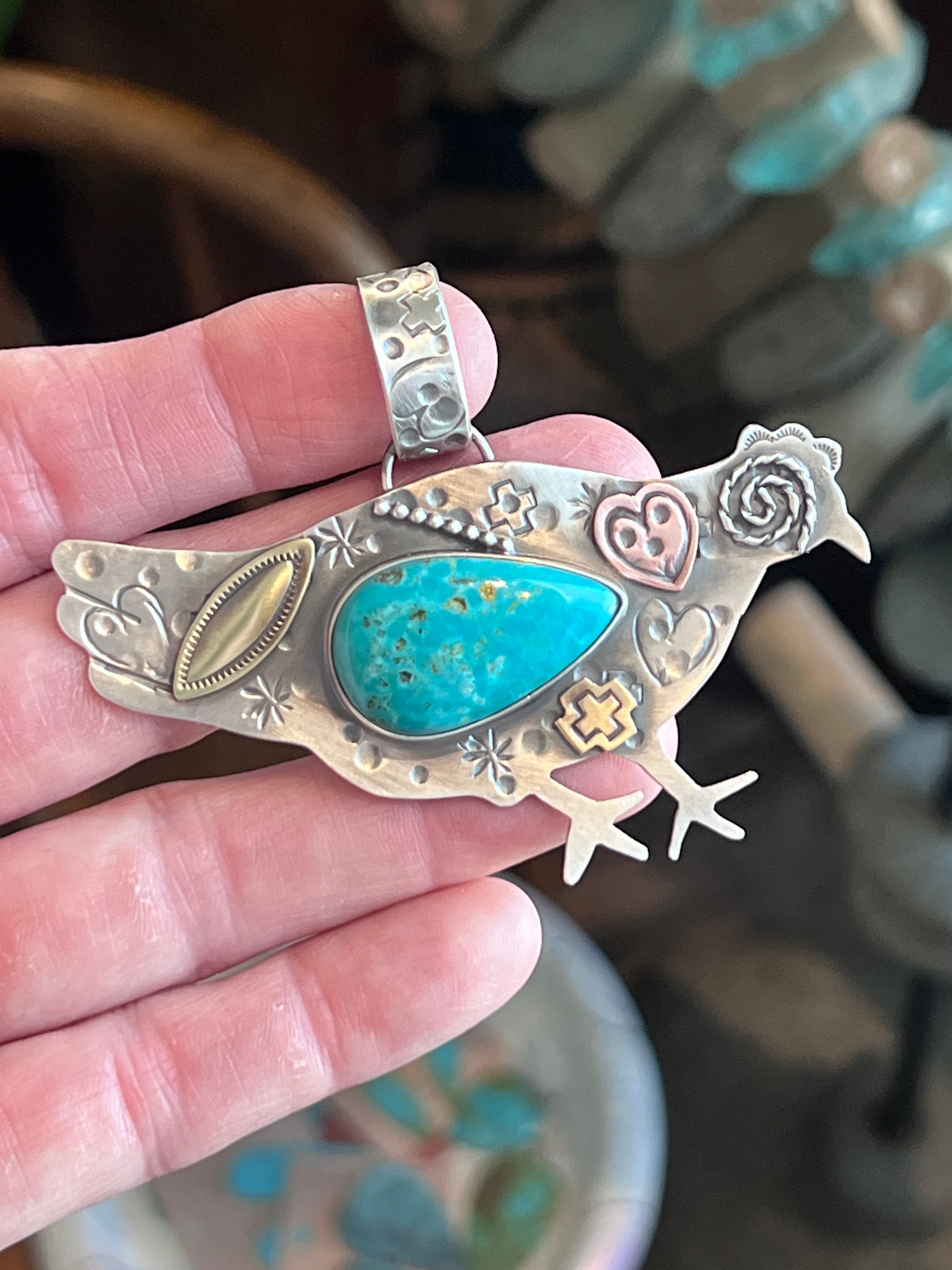 The Nizhoni Cluckers: Hand Stamped and Layered Sterling Silver, Brass, Copper & Kingman Turquoise Chicken Pendants by Kimari Somers