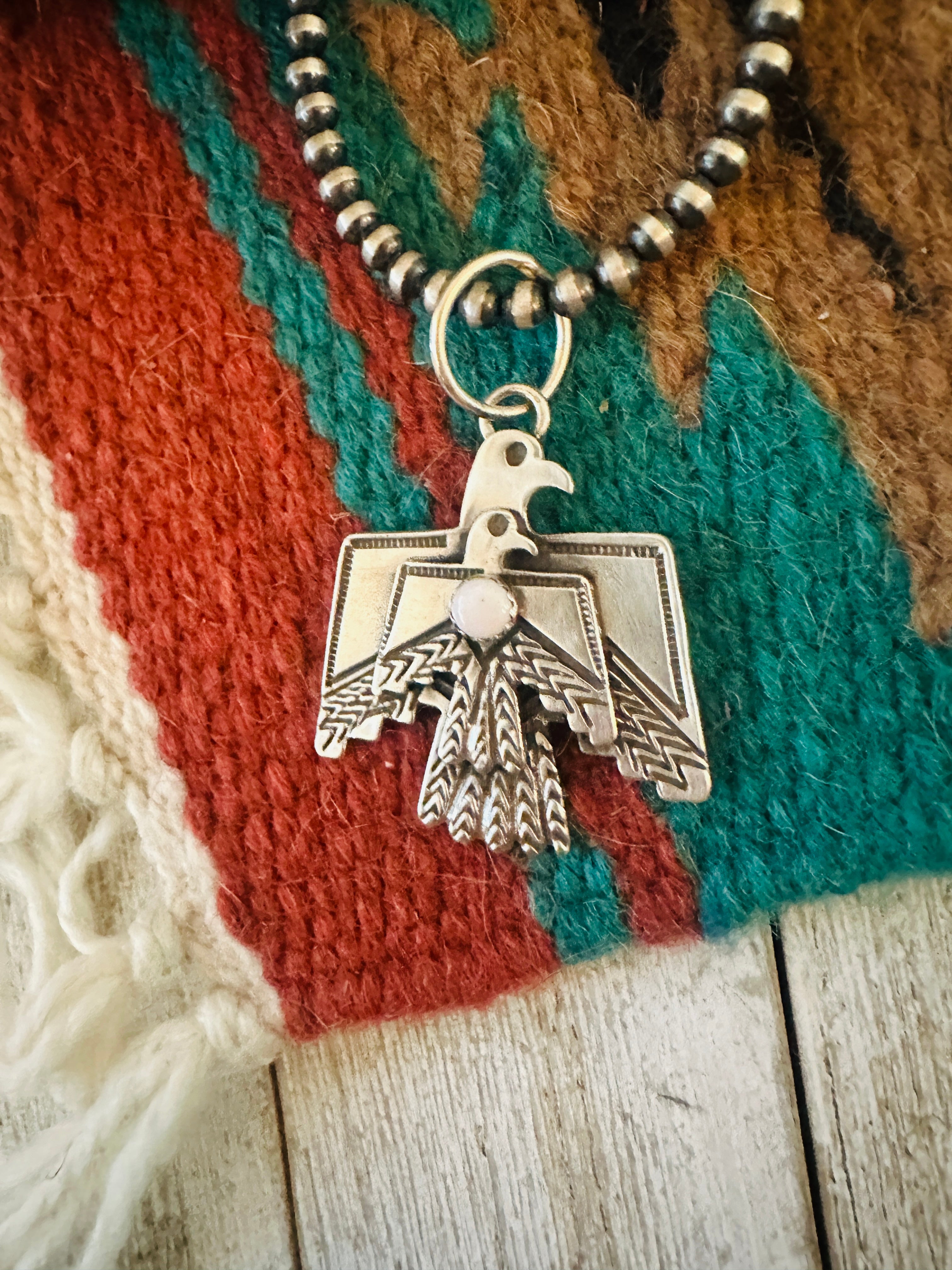 Handcrafted Sterling Silver & Queen Pink Conch Thunderbird Pendant