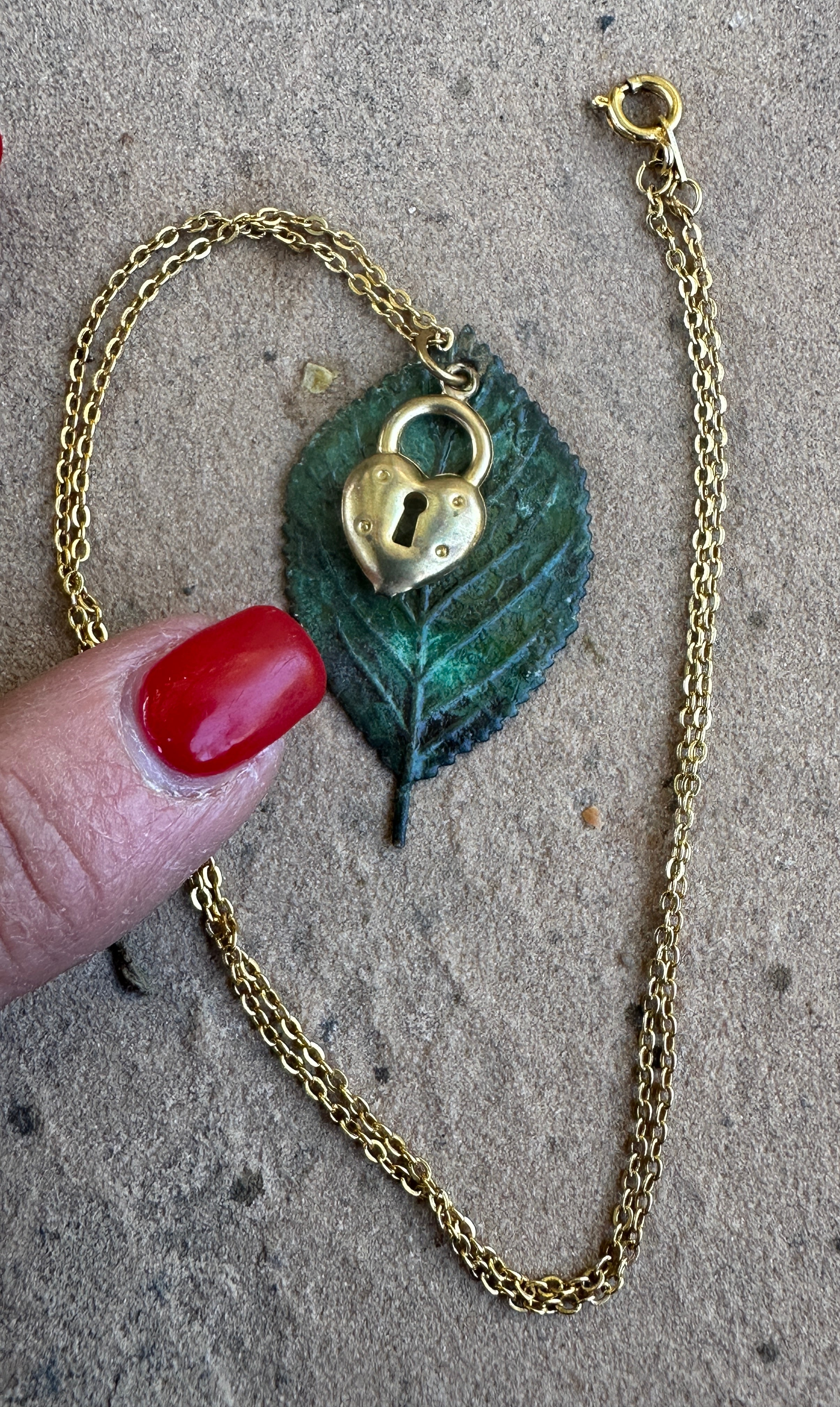 Yellow gold, brass locket, moldavite leaf pendant 18” necklace