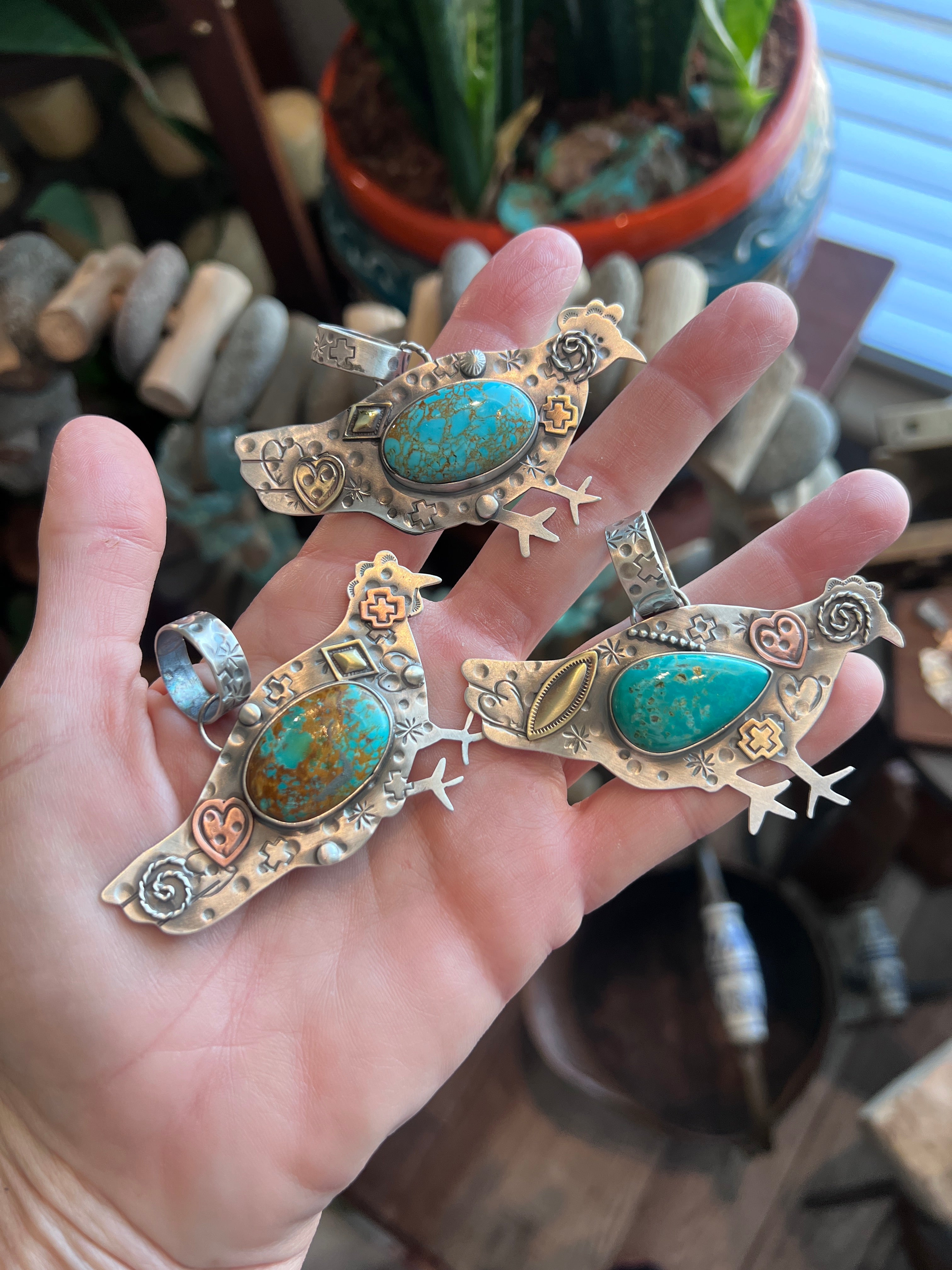 The Nizhoni Cluckers: Hand Stamped and Layered Sterling Silver, Brass, Copper & Kingman Turquoise Chicken Pendants by Kimari Somers