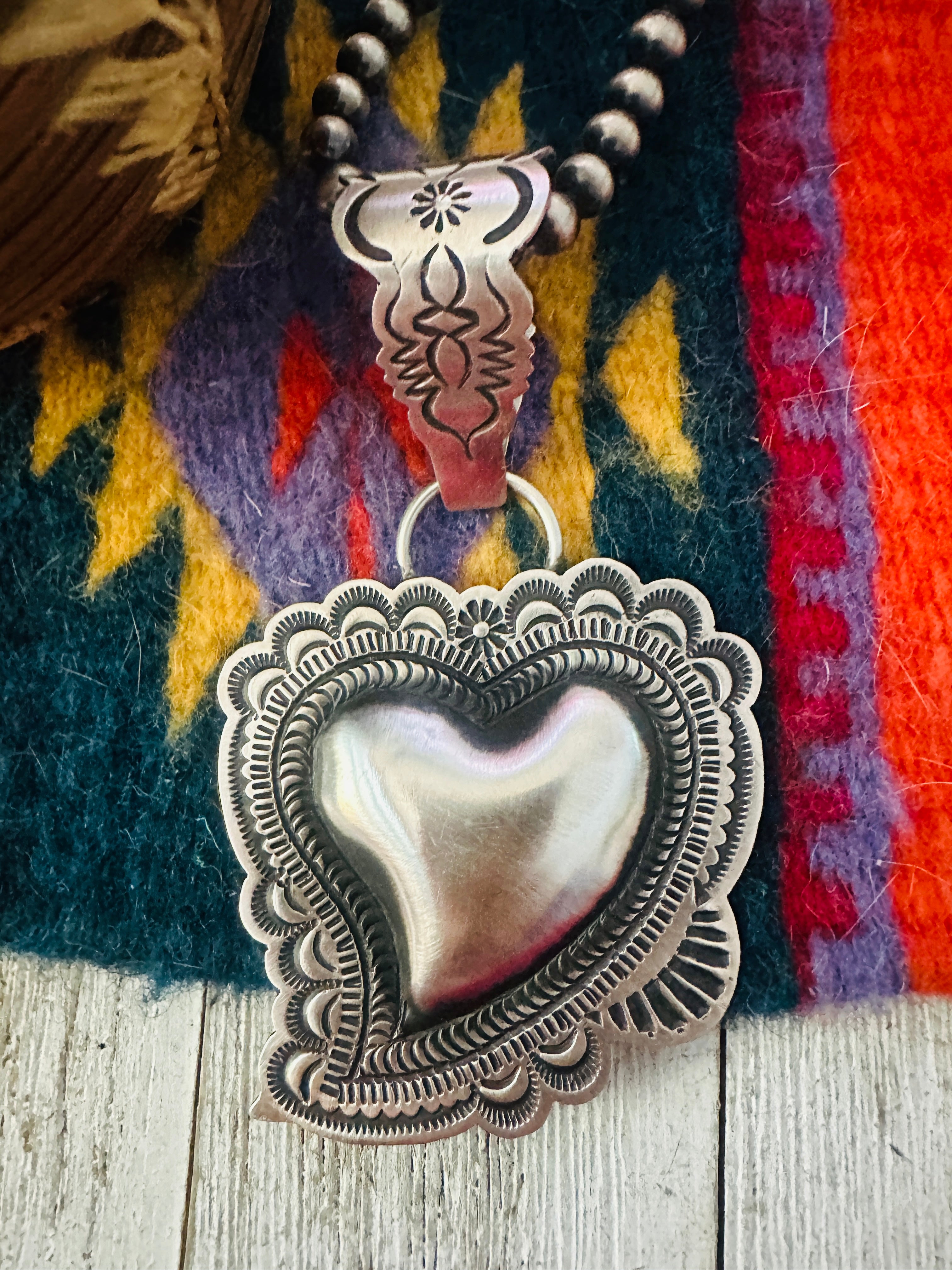 Handcrafted Sterling Silver Heart Concho Pendant by Leander Tahe