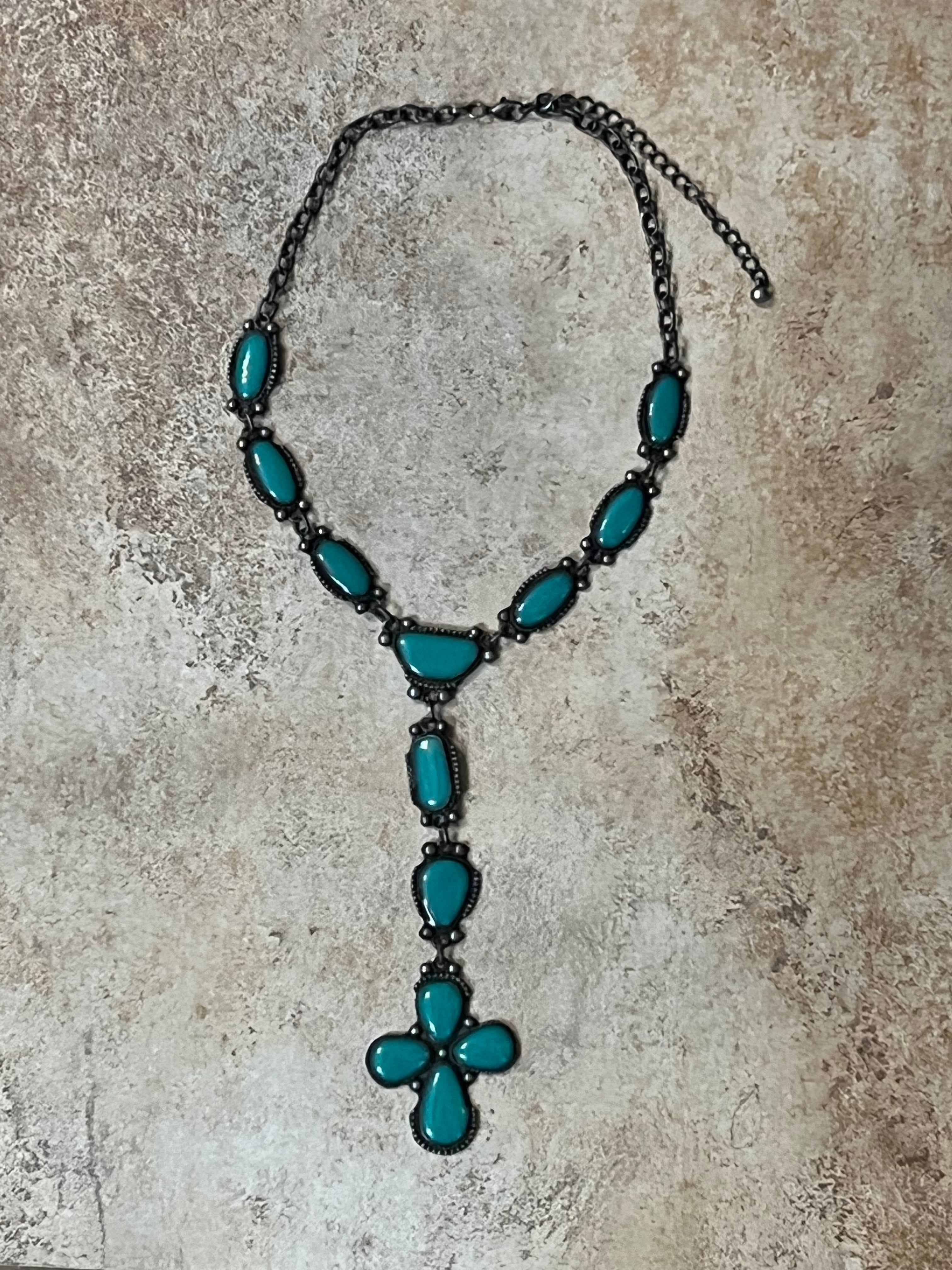 Turquoise Colored Tree Sap Cross Necklace
