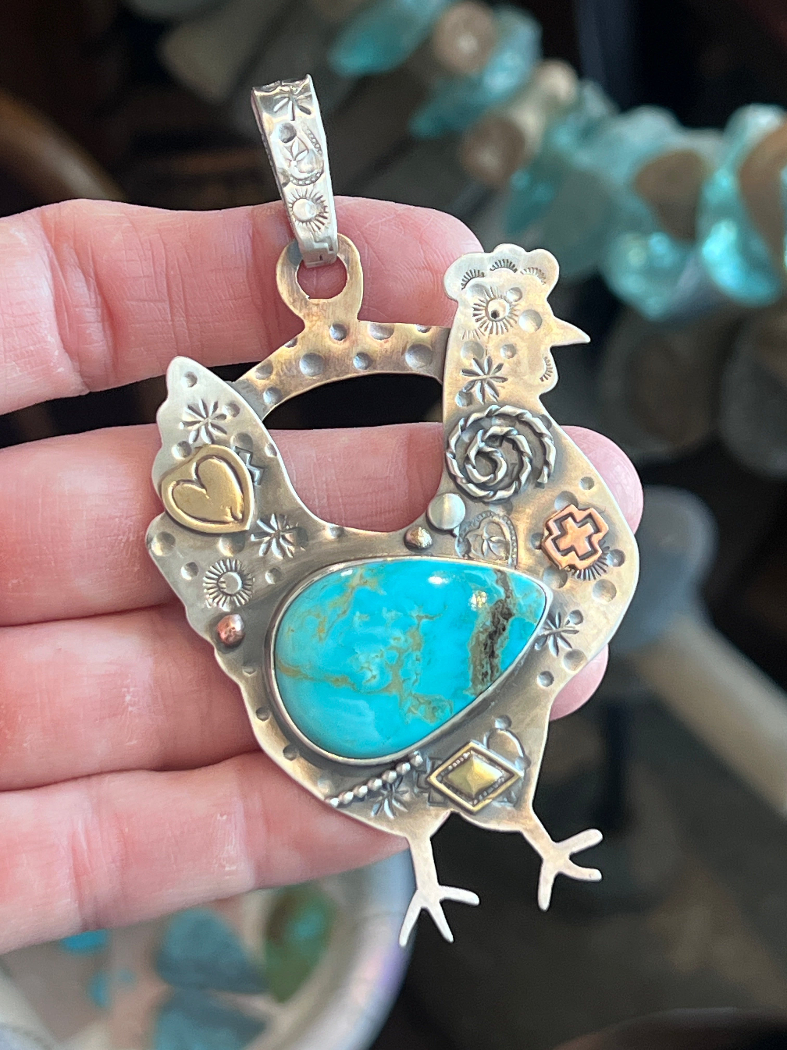 The Nizhoni Cluckers: Hand Stamped and Layered Sterling Silver, Brass, Copper & Kingman Turquoise Chicken Pendants by Kimari Somers