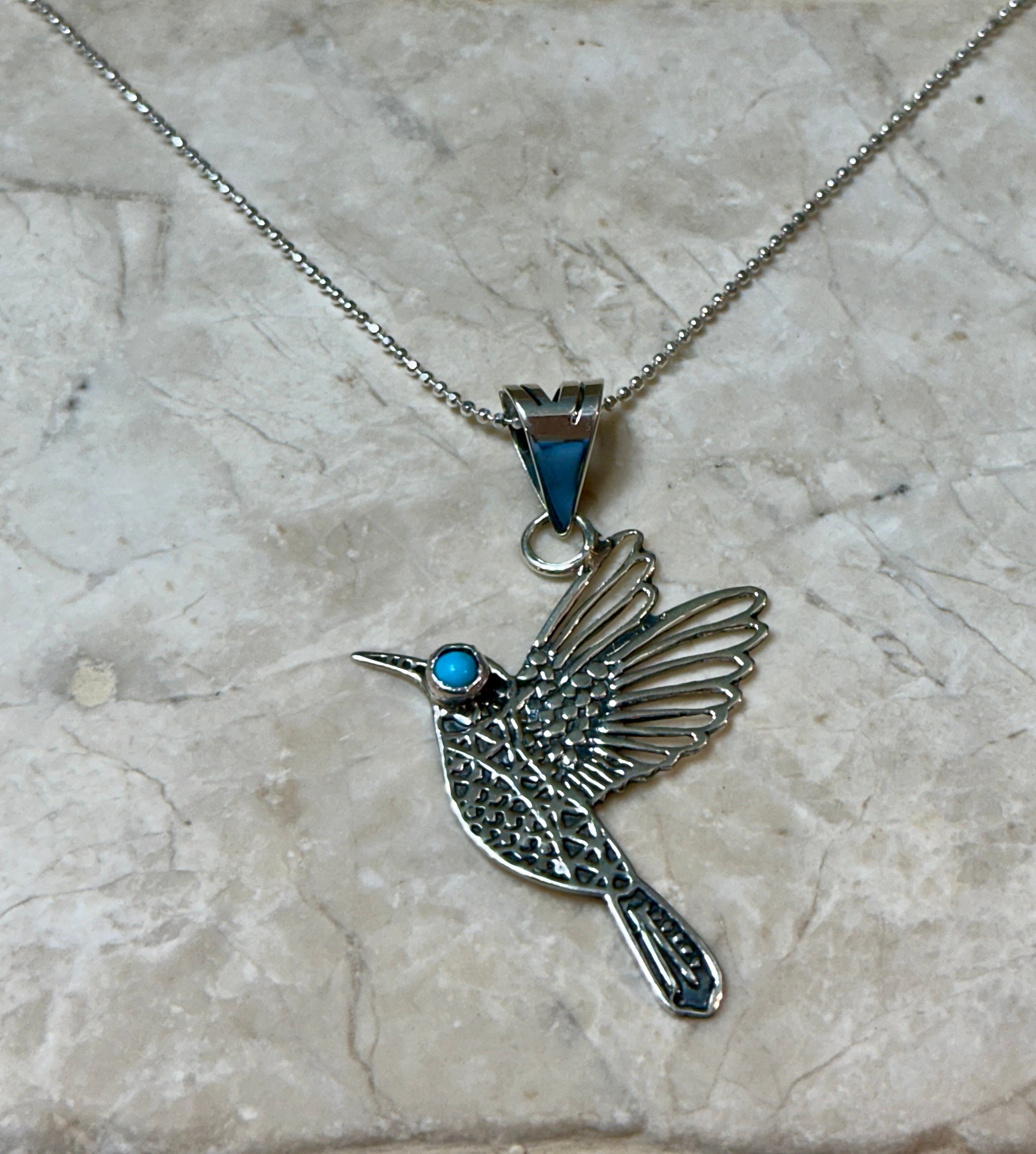 Bird with Turquoise Eyes Sterling Silver Necklace