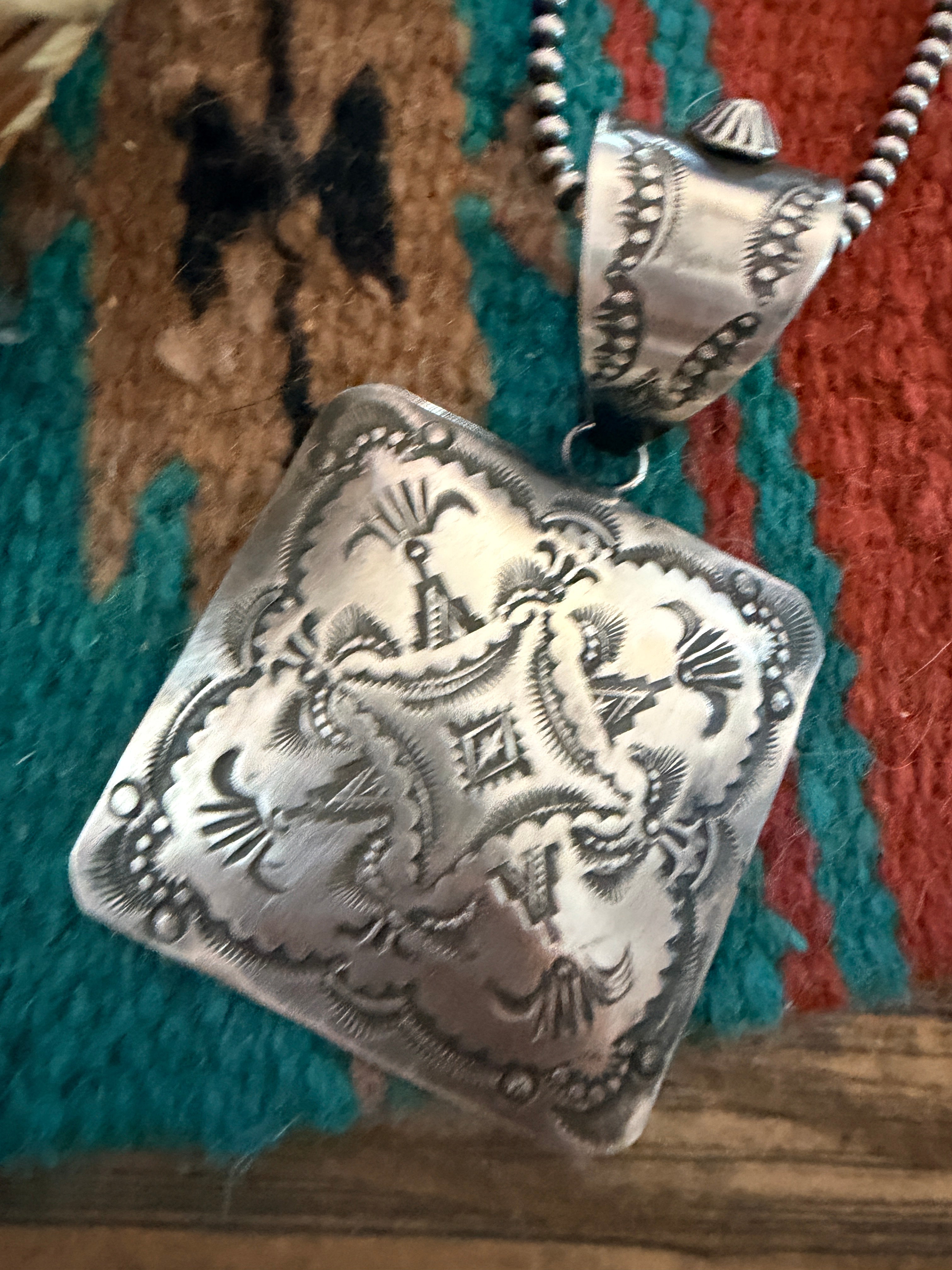 Handcrafted Sterling Silver Concho Pendant by Vincent Platero