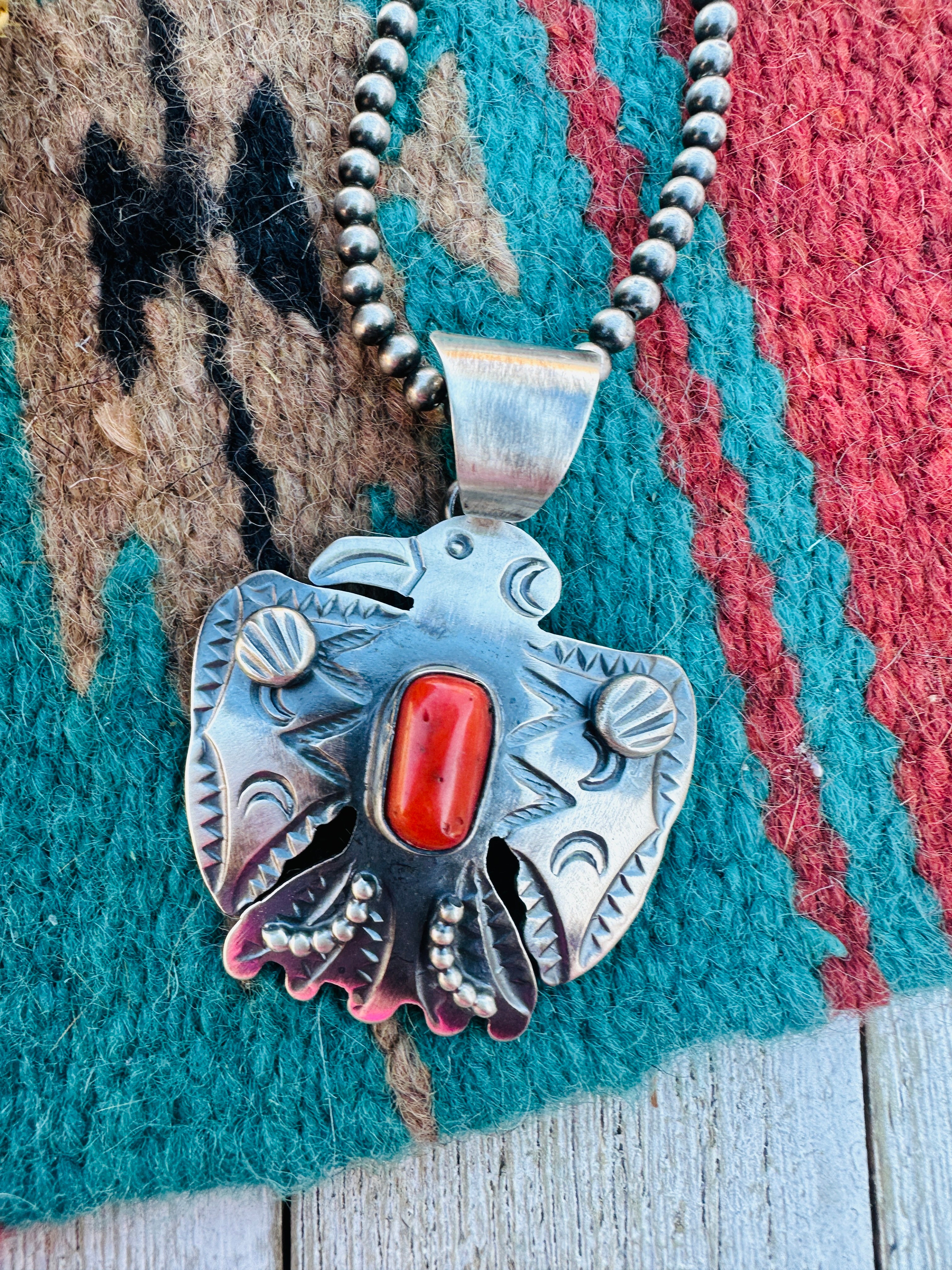 Handcrafted Sterling Silver & Coral Thunderbird Pendant by Chimney Butte