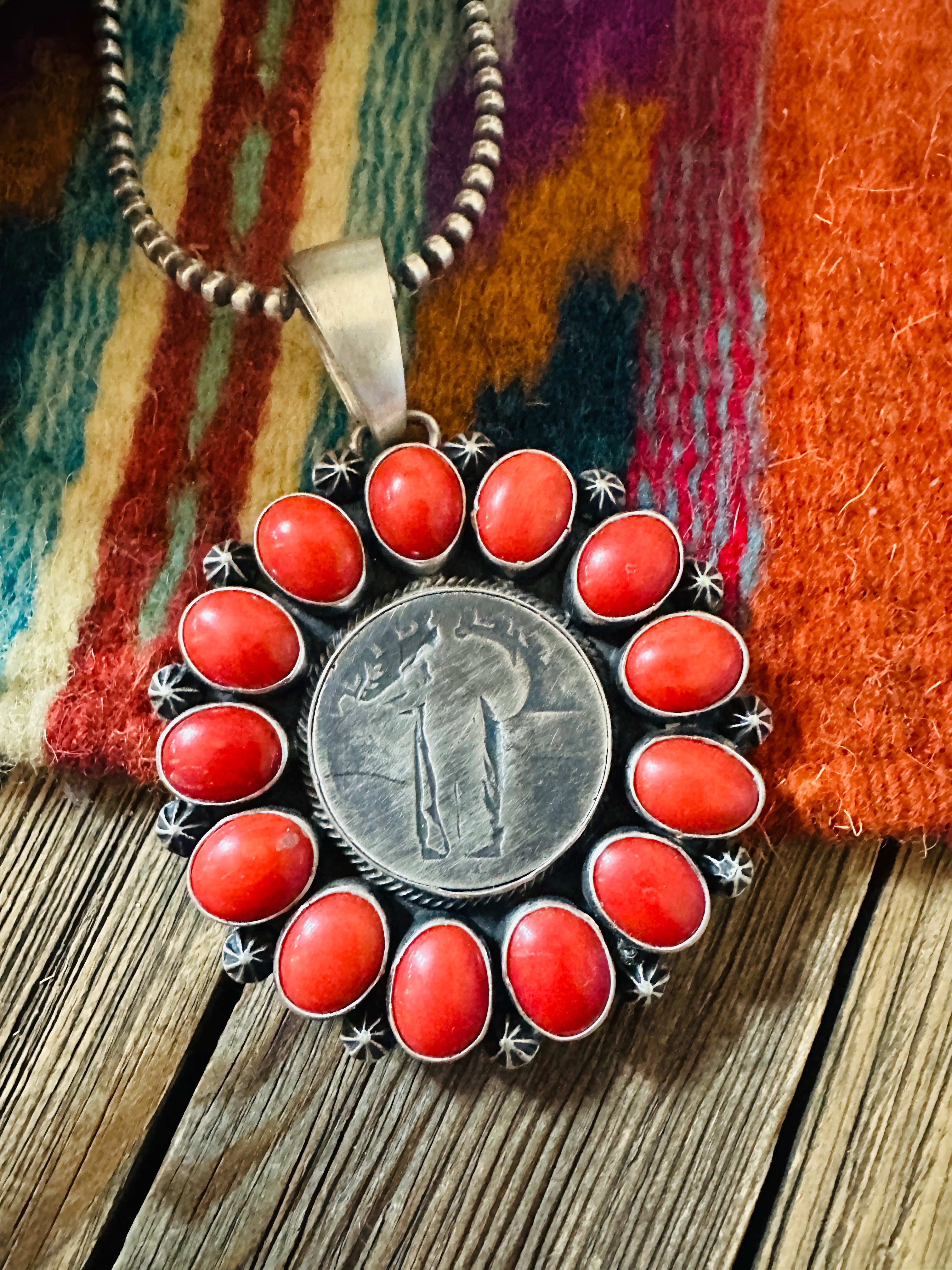 Handcrafted Sterling Silver and Coral Liberty Coin Pendant by Darrin Livingston