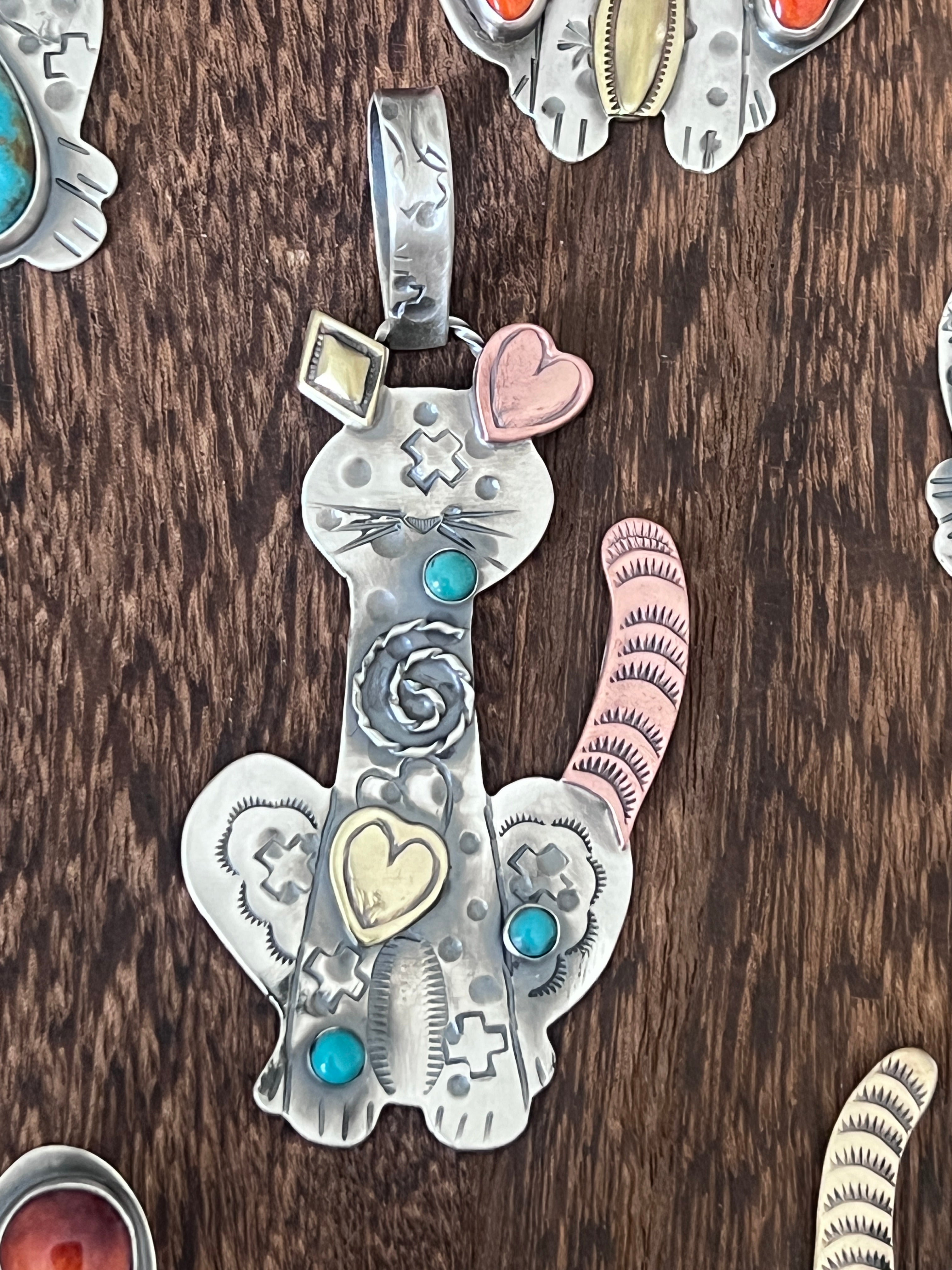 The Kimi-Cats: Hand Stamped and Layered Sterling Silver, Brass, Copper, Turquoise & Spiny Oyster Cat Pendants by Kimari Somers