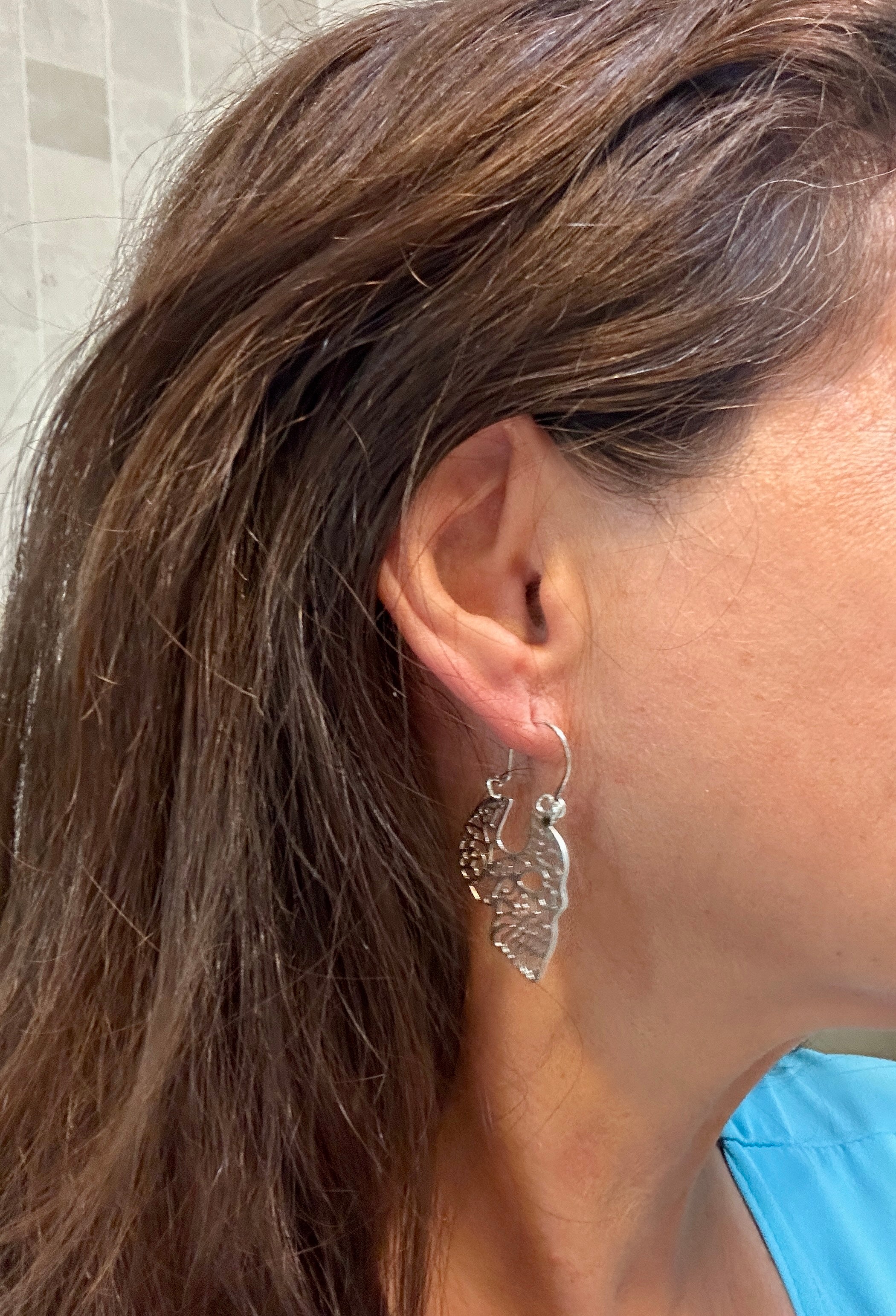 Pierced Skull Profile Sterling Silver Earrings