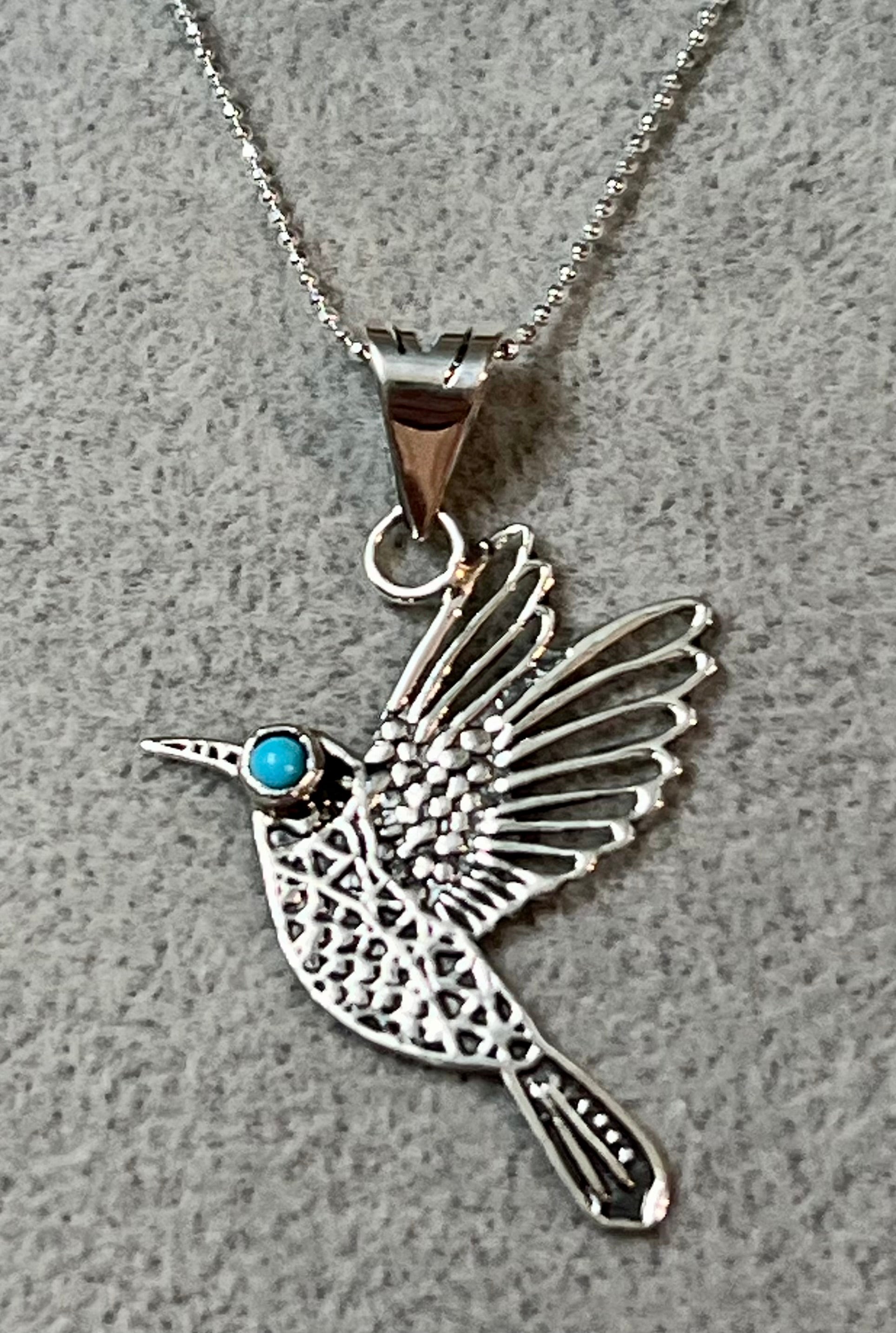 Bird with Turquoise Eyes Sterling Silver Necklace