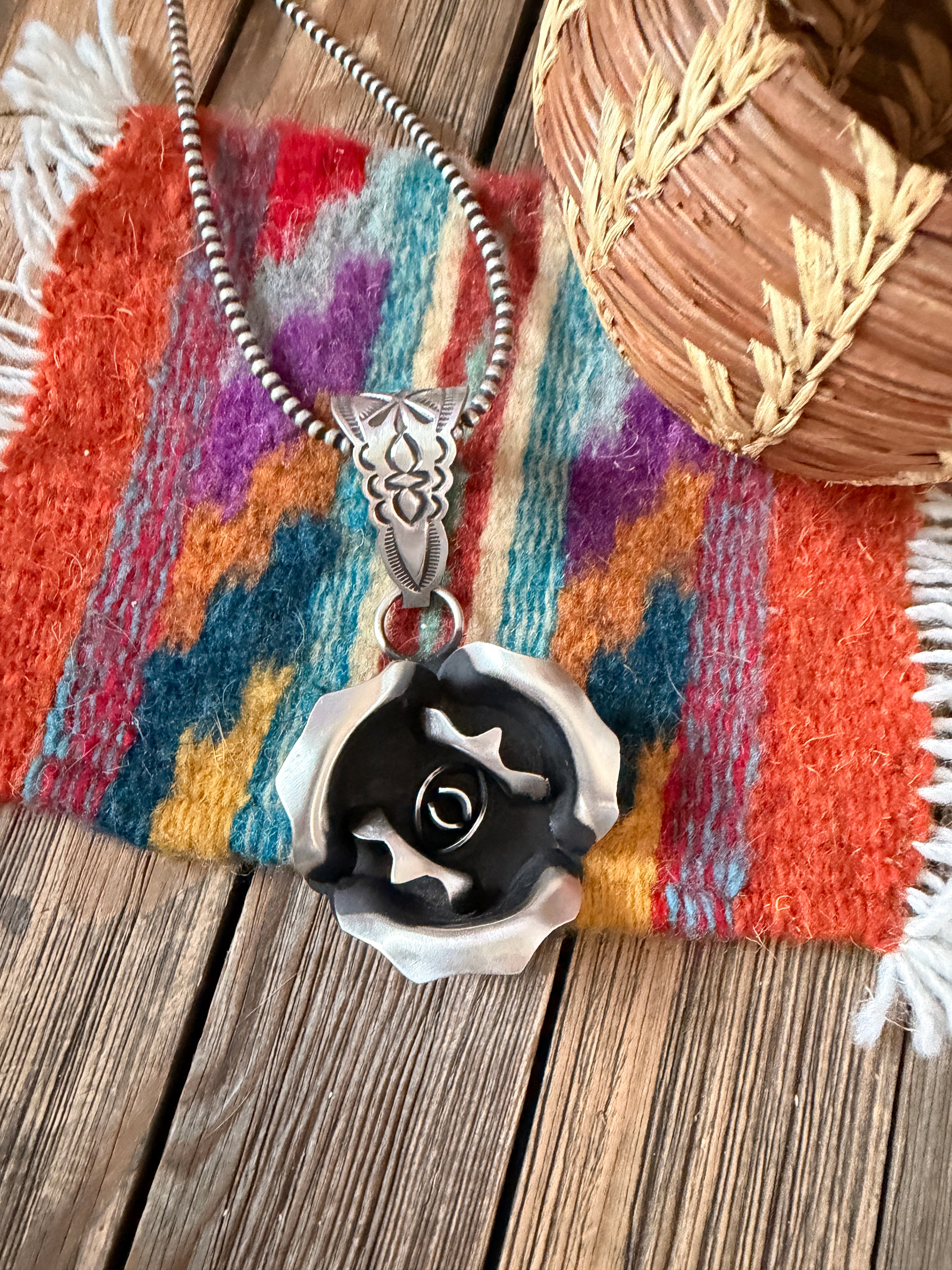 Handcrafted Sterling Silver Rose Pendant by Leander Tahe