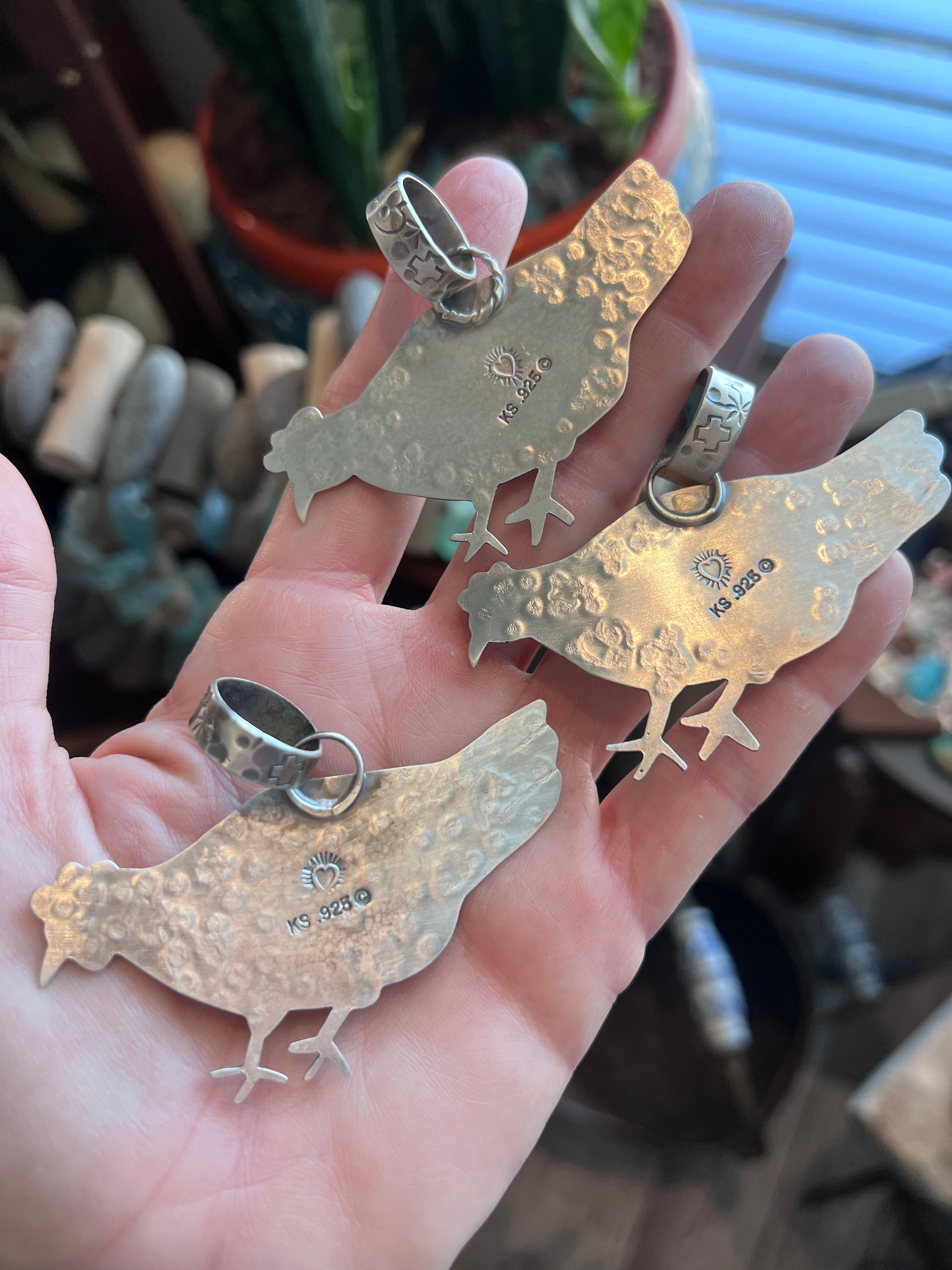 The Nizhoni Cluckers: Hand Stamped and Layered Sterling Silver, Brass, Copper & Kingman Turquoise Chicken Pendants by Kimari Somers