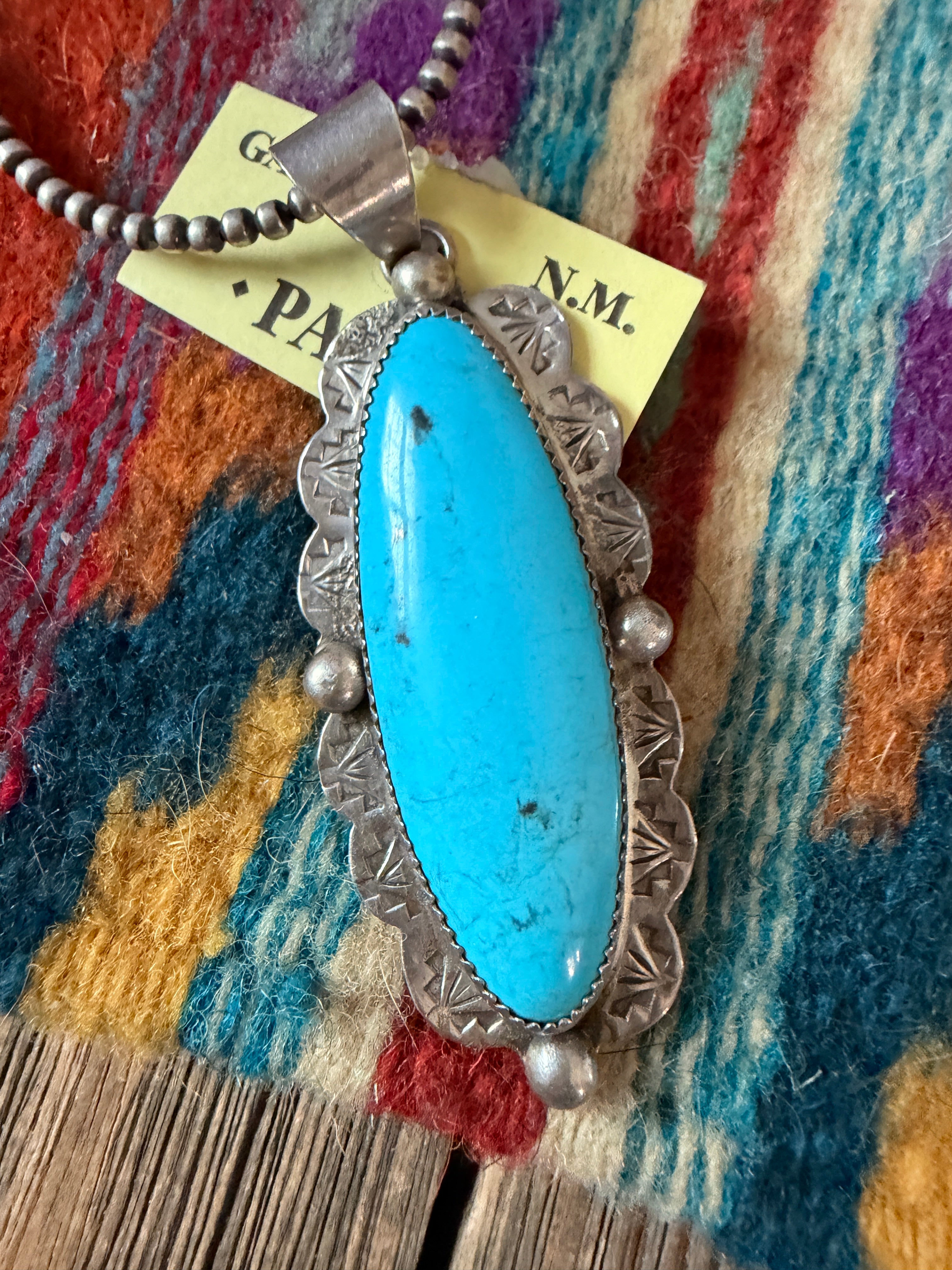 Old Pawn Handcrafted Turquoise and Sterling Silver Pendant